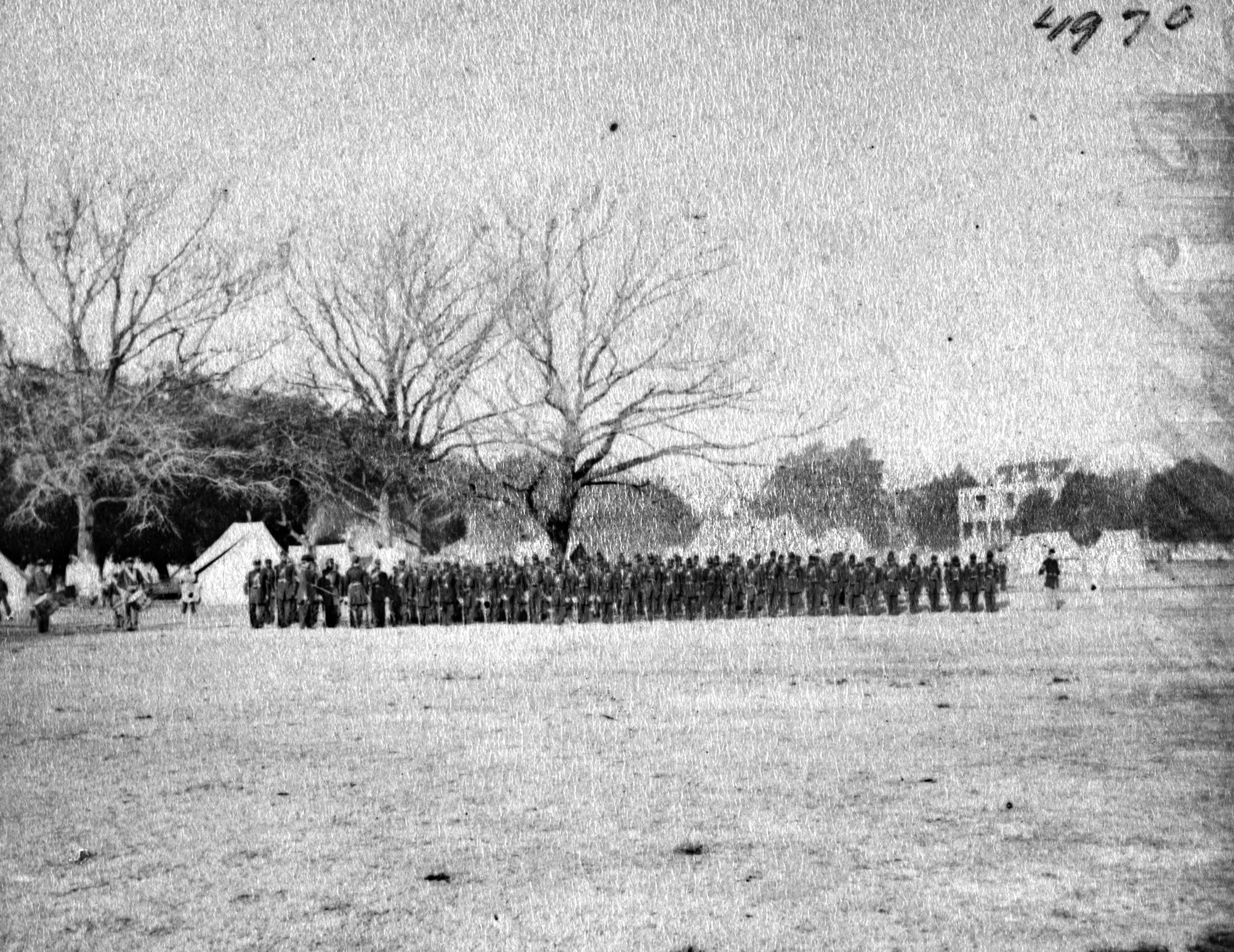 The 1st South Carolina Regiment of U.S. Colored Troops is shown on parade in Beaufort, South Carolina, in a period photograph. 