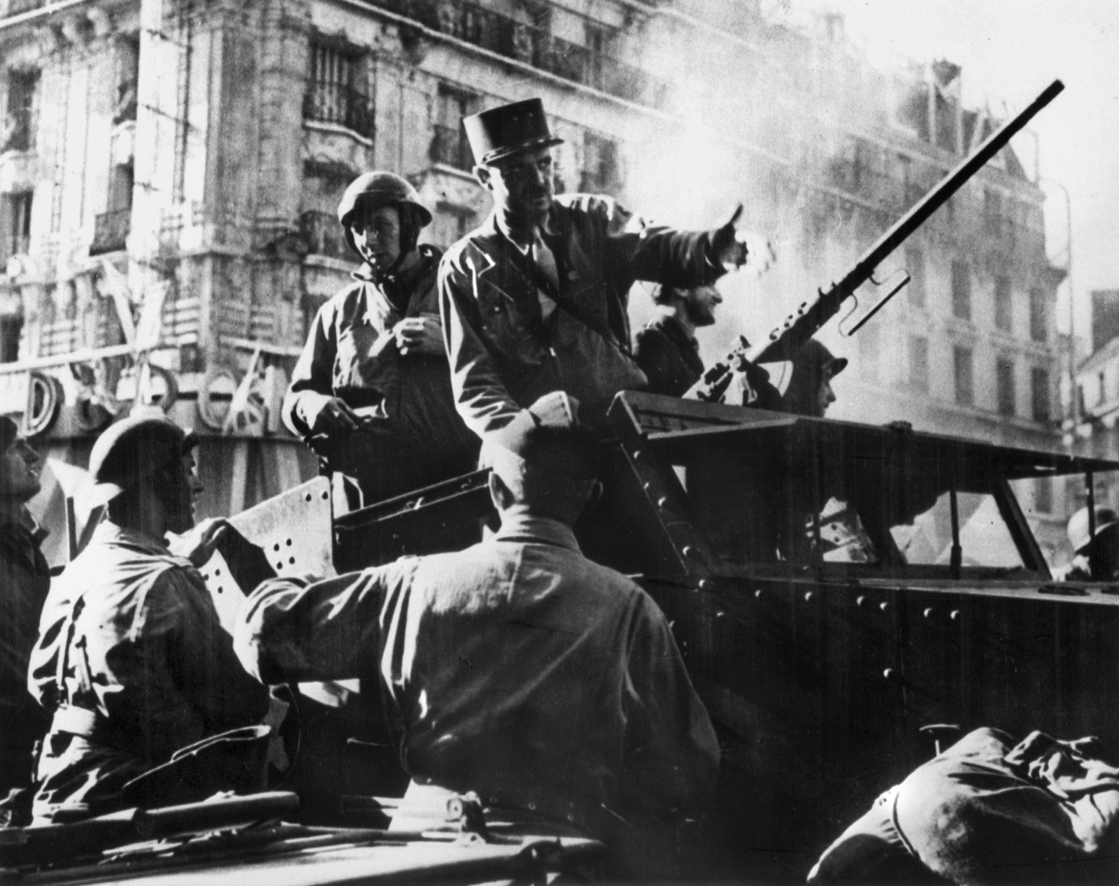 Maj. Gen. Jacques Leclerc, commander of the 2nd Free French Armored Division, gives commands to Free French forces during the liberation of Paris, August 25, 1944.