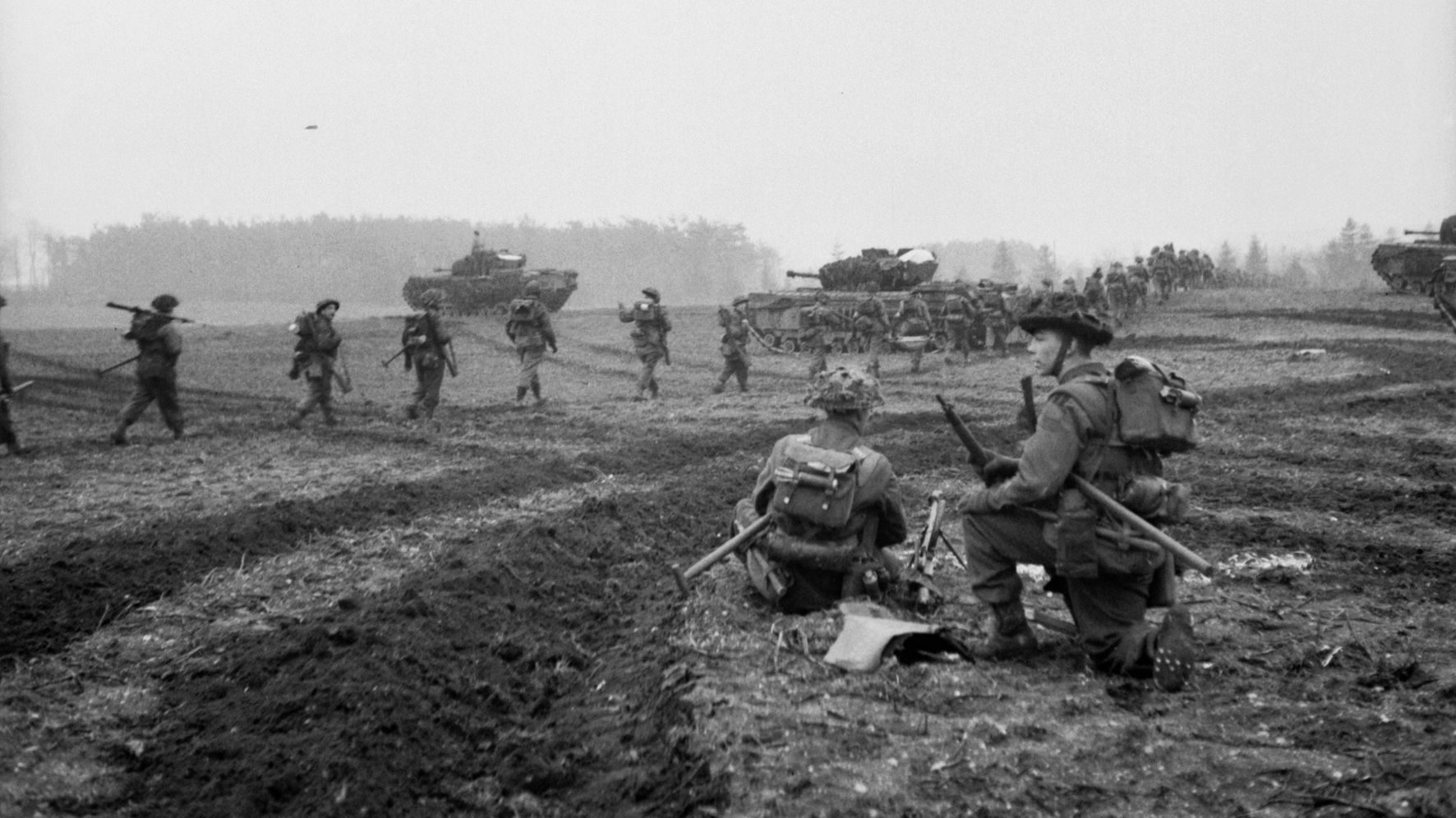 British Churchill tanks support the advance of infantrymen of the 2nd Argyll and Sutherland Highlanders on February 8, 1945. The British advance into the Reichswald was agonizingly slow, and casualties were heavy as the effort to reach the Ruhr bogged down against heavy German resistance.
