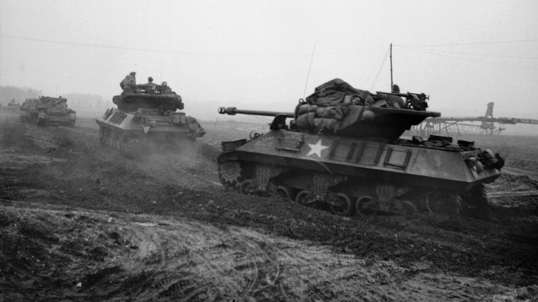 During the opening hours of Operation Veritable, Achilles tank destroyers of the 15th Scottish Division advance toward the Reichswald on February 8, 1945. The main armament of the Achilles was a 17-pounder gun mounted in an open turret.