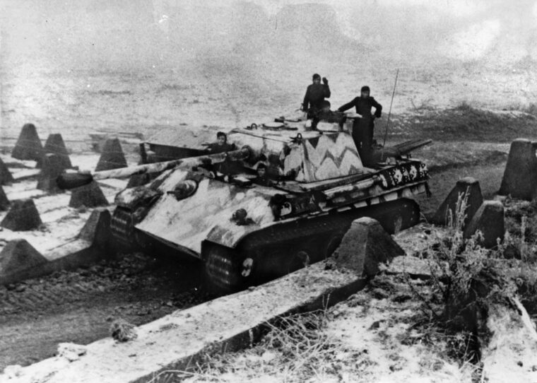 Moving into position along the German frontier, this PzKpfw. V Panther tank was photographed several weeks prior to the initiation of Operation Veritable.  