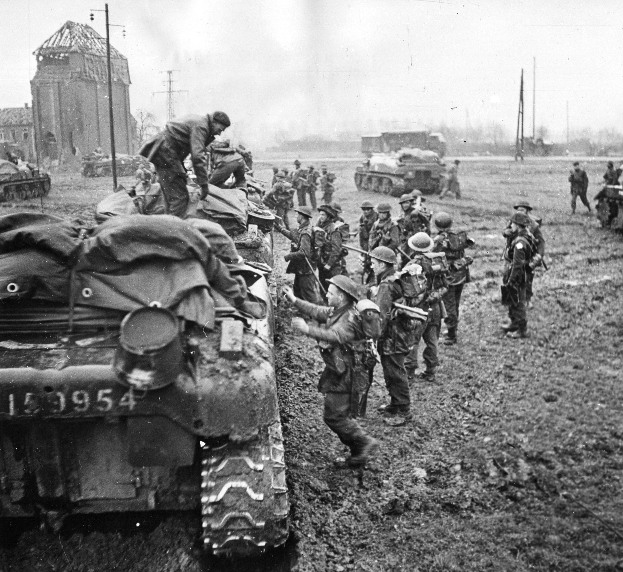 The fighting in the Reichswald wore on and took an incredible toll in both Allied and German casualties. On March 2, 1945, British soldiers prepare to board Kangaroo troop carriers for the assault on the German town of Kervenheim, three miles south of Udem, another key town that had to be taken during the sluggish advance toward the Ruhr.