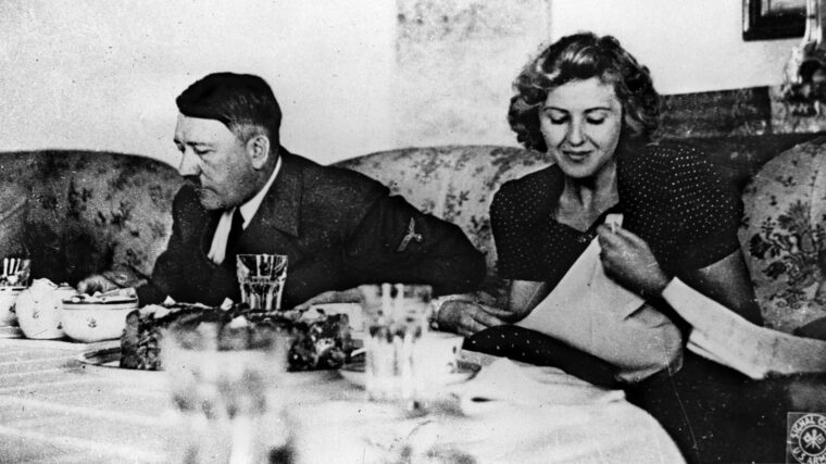 Hitler and Eva Braun dining at a tea house in 1942. One assassination scheme involved poisoning Hitler’s tea.