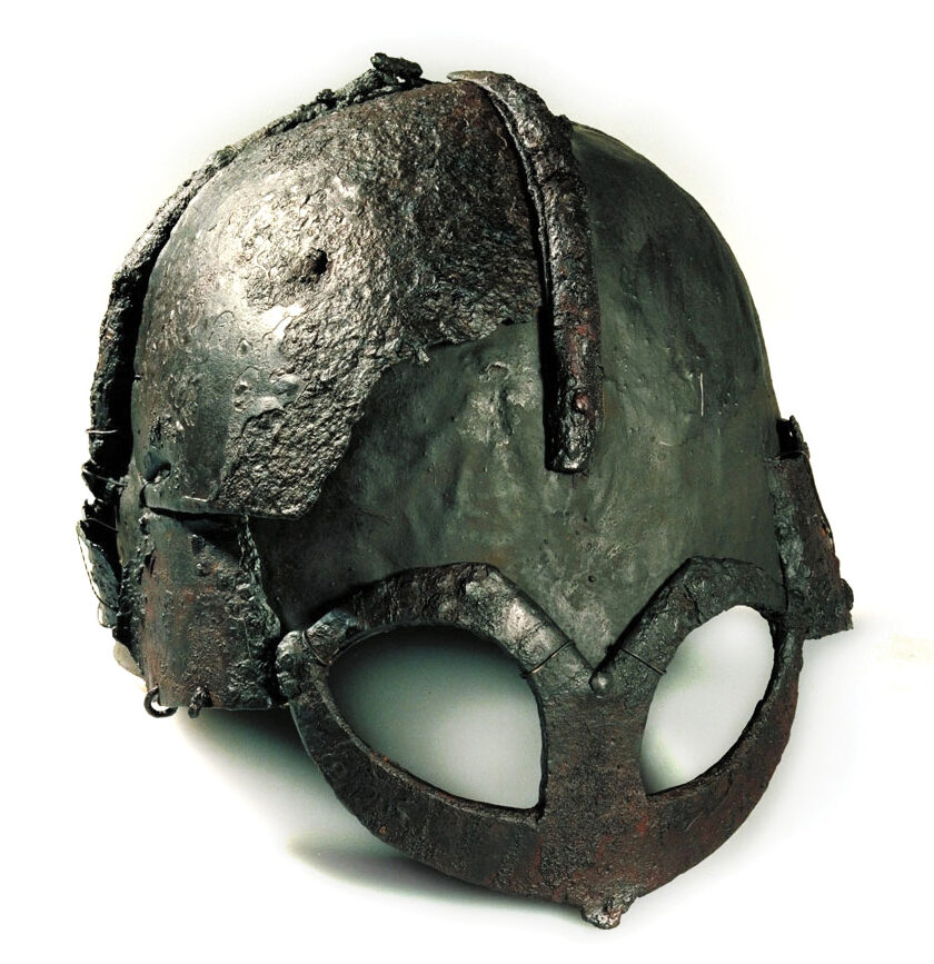 An iron helmet unearthed from a Viking burial mound in Norway. 