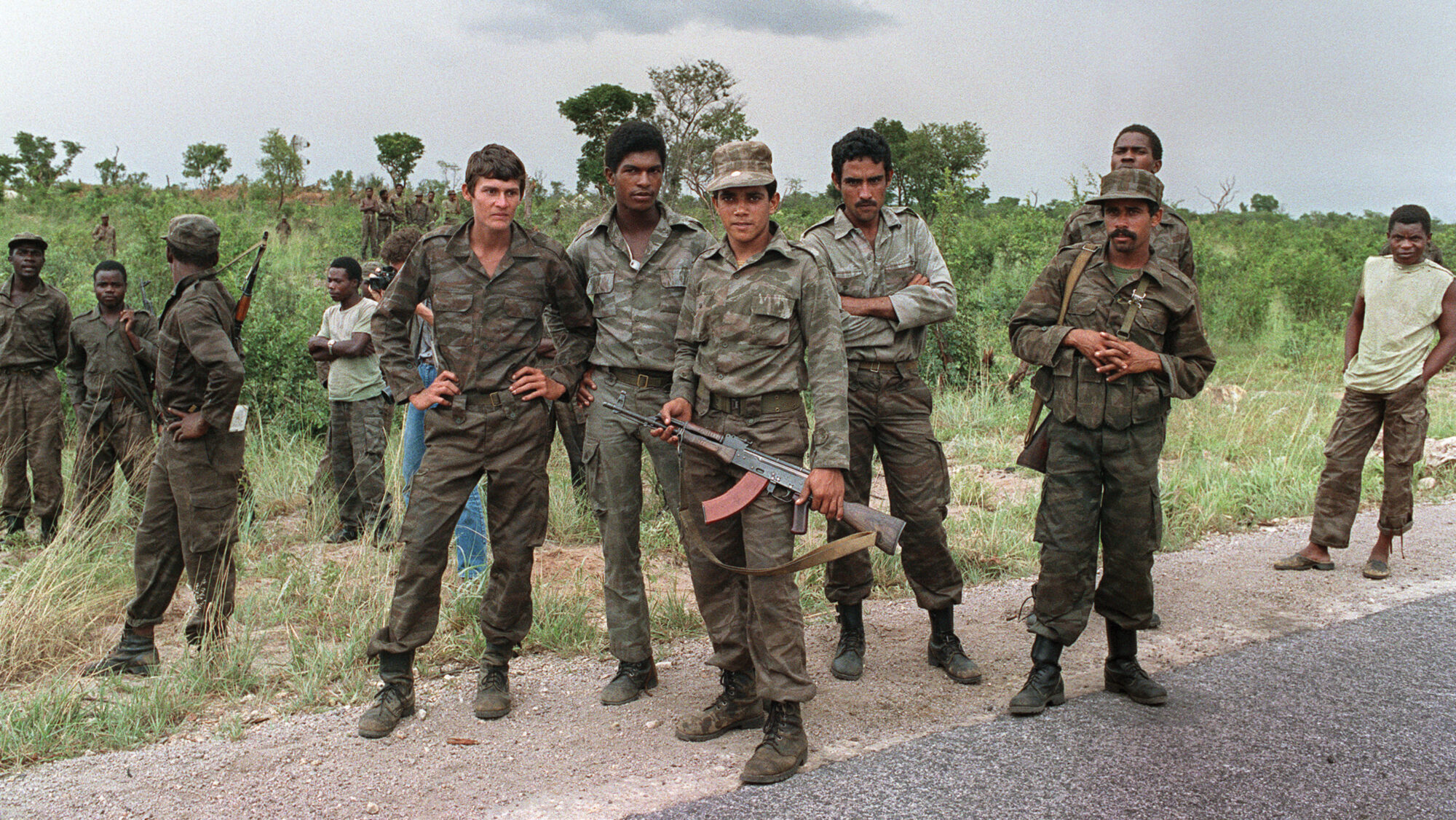 Cuban soldiers pose with Soviet-backed Popular Movement for the Liberation of Angola soldiers near Cuito Cuanavale. The struggle between pro-Western and pro-Soviet military factions in Angola was a major front in the Cold War, resulting in the participation of 40,000 Cuban troops.