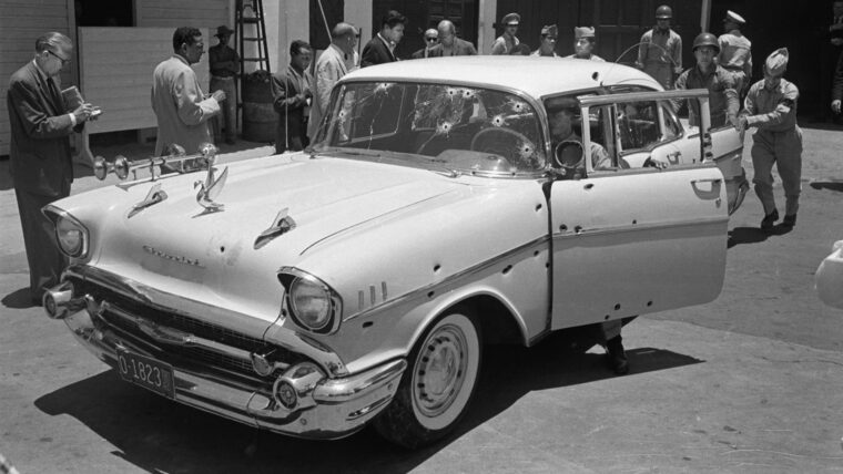 Rafael Trujillo’s 1957 American Chevrolet on display following his assassination on May 30, 1961. During the ambush, Trujillo stumbled wounded out of his car, only to be shot dead in the street.