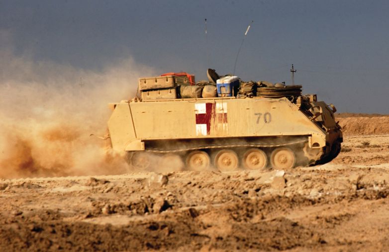 A medical truck rushes the wounded to field facilities during combat in Fallujah, Iraq in 2004.
