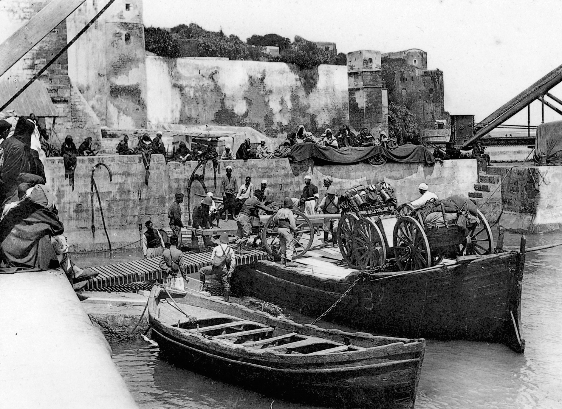 French guns are loaded onto boats in Rabat for ferrying across the Bou Regreg River in western Morocco in 1911.
