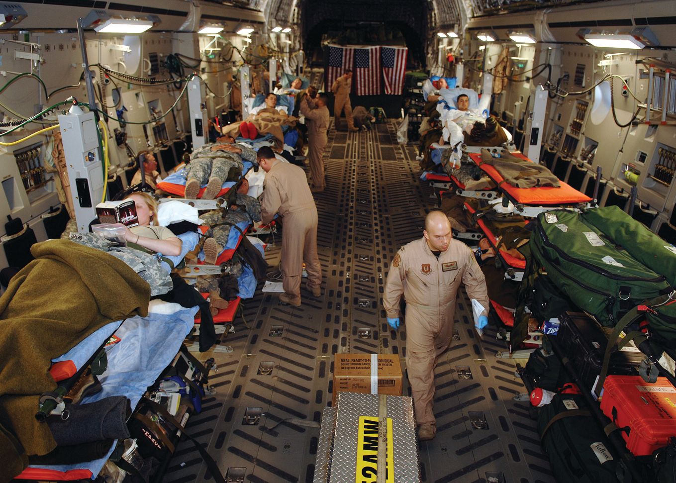 A well-equipped U.S. Air Force C-17 aero-medical evacuation team transports wounded American soldiers from Iraq to Ramstein Air Base, Germany, in 2007.