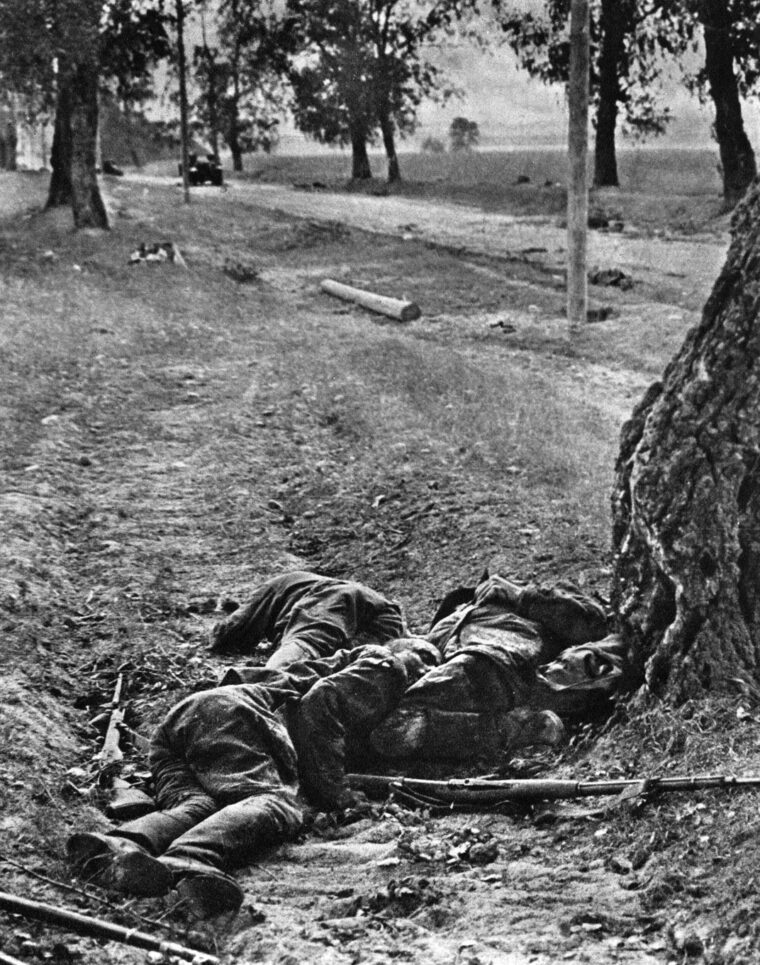 Three Soviet soldiers lie where they were killed trying to stop the German invasion.
