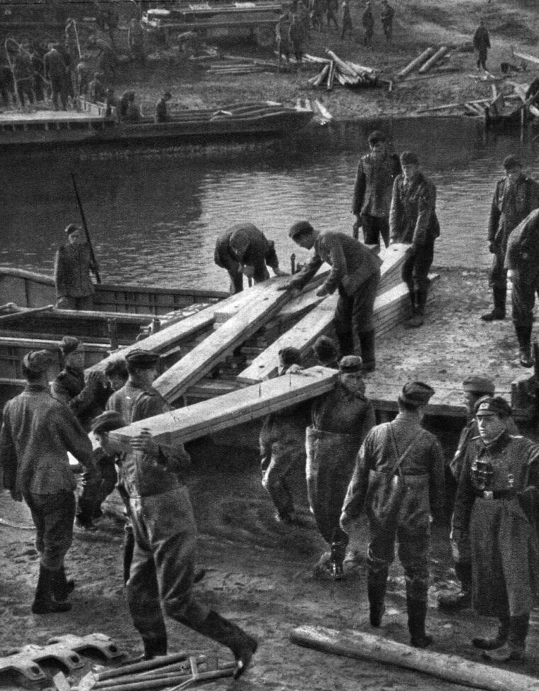 German pioneers (combat engineers) build a bridge over the Dnieper River to replace one that was destroyed by the retreating Red Army. 
