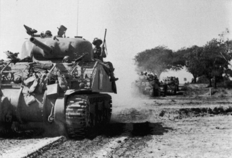 Sherman tanks of the 5th Horse, an Indian armored cavalry regiment, rumble toward Meiktila. The tank crews were particularly adept at blasting bunkers that served as enemy strongpoints.