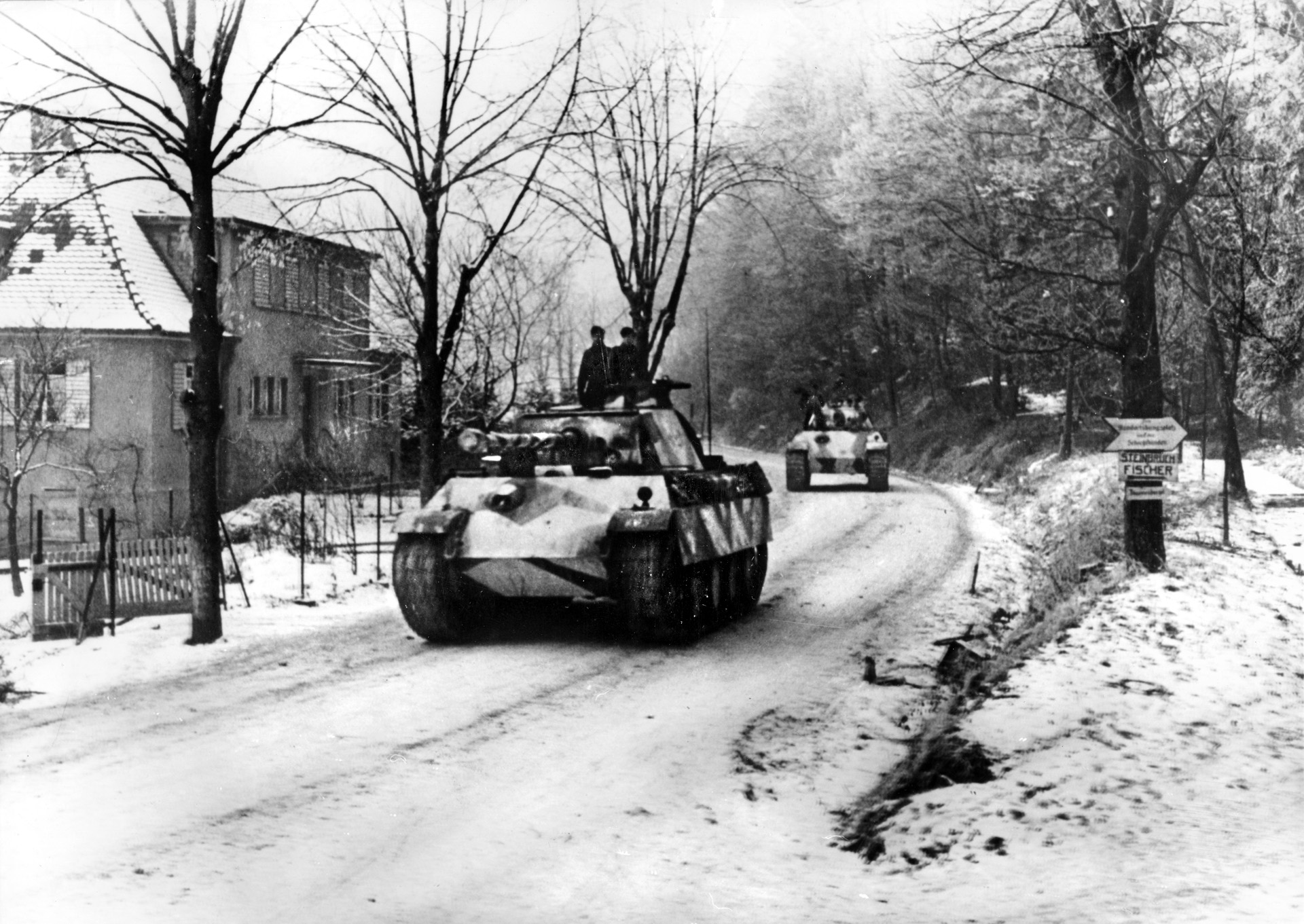 Hitler’s 1944-45 winter counteroffensive caught the U.S. command totally off guard and permitted German forces to crash through American lines along the German border with Belgium, Luxembourg, and northeast France. Thousands of U.S. troops were killed or taken prisoner. Here, German armor drives through the snow-covered Hagenauer Forest in the lower Vosges Mountain, January 3, 1945.