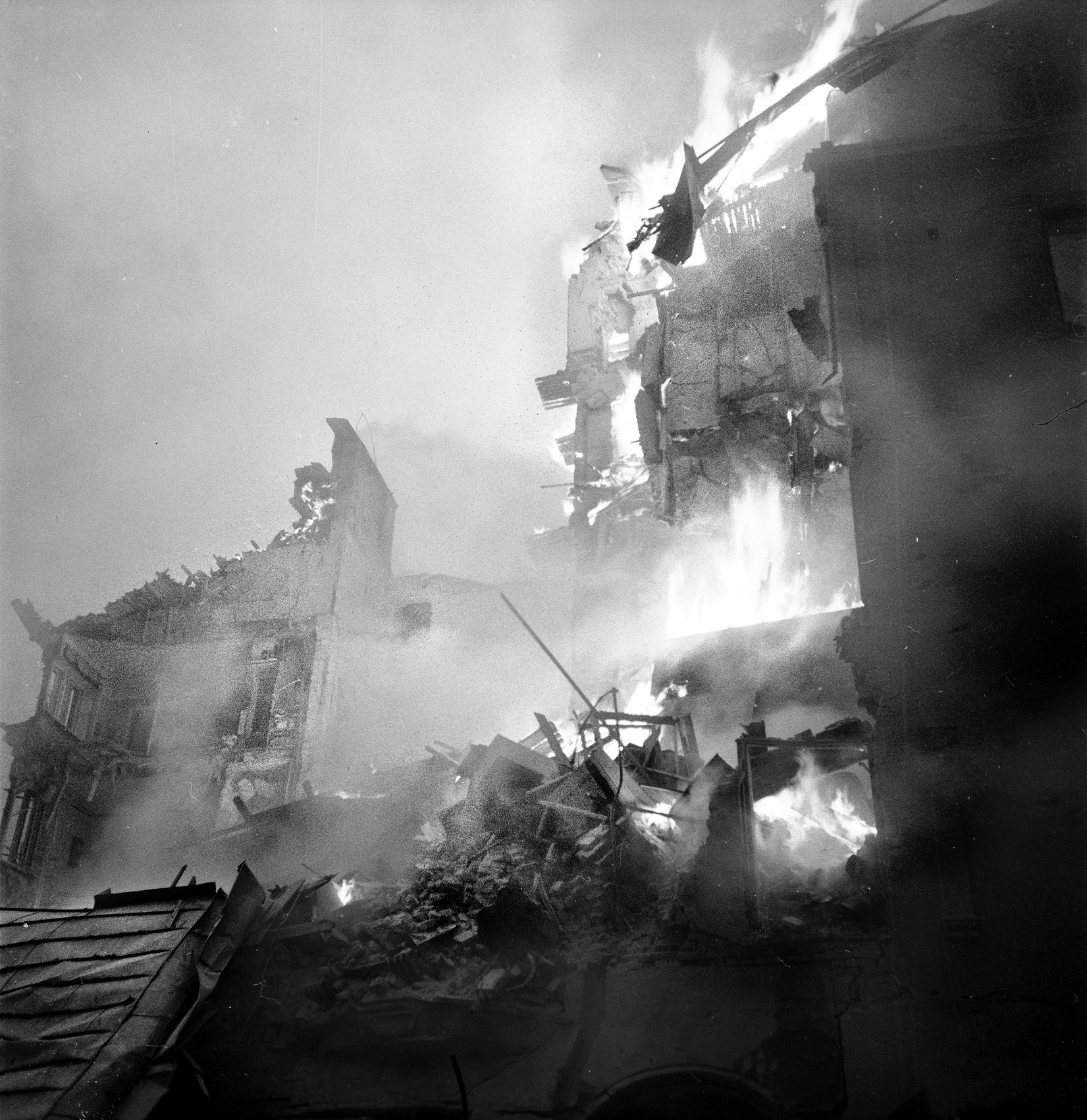 Buildings in the Finnish capital Helsinki burn after one of eight Soviet bombings during the Winter War that killed 97 civilians. The U.S. protested, but was rebuffed by the Soviets.