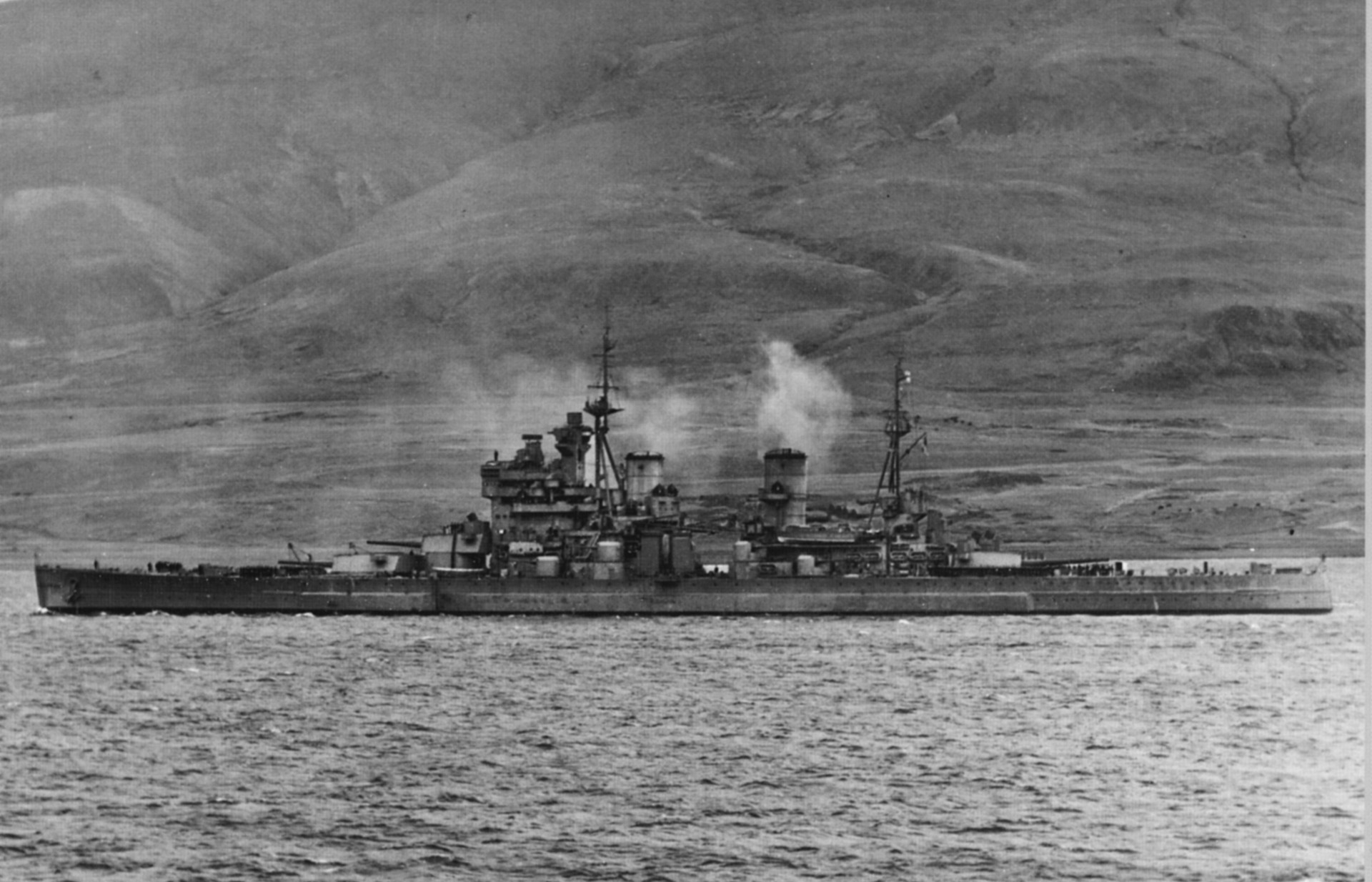 Photo taken from Prinz Eugen shows Bismarck firing on HMS Prince of Wales. The British ship was hit and badly damaged but did not sink.