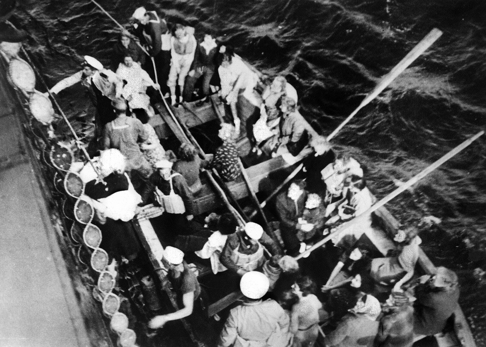 Survivors of the British liner Athenia, torpedoed by U-30, are brought aboard the merchant ship City of Flint. A month later, City of Flint was captured on the high seas by the German pocket battleship Deutschland.