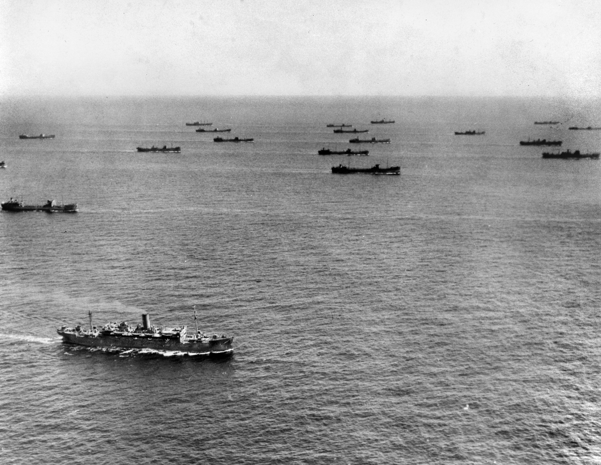 A large convoy steams south of Newfoundland in July 1942. The convoy system allowed Allied escort ships to provide better protection against marauding U-boats during the perilous Atlantic crossing.  