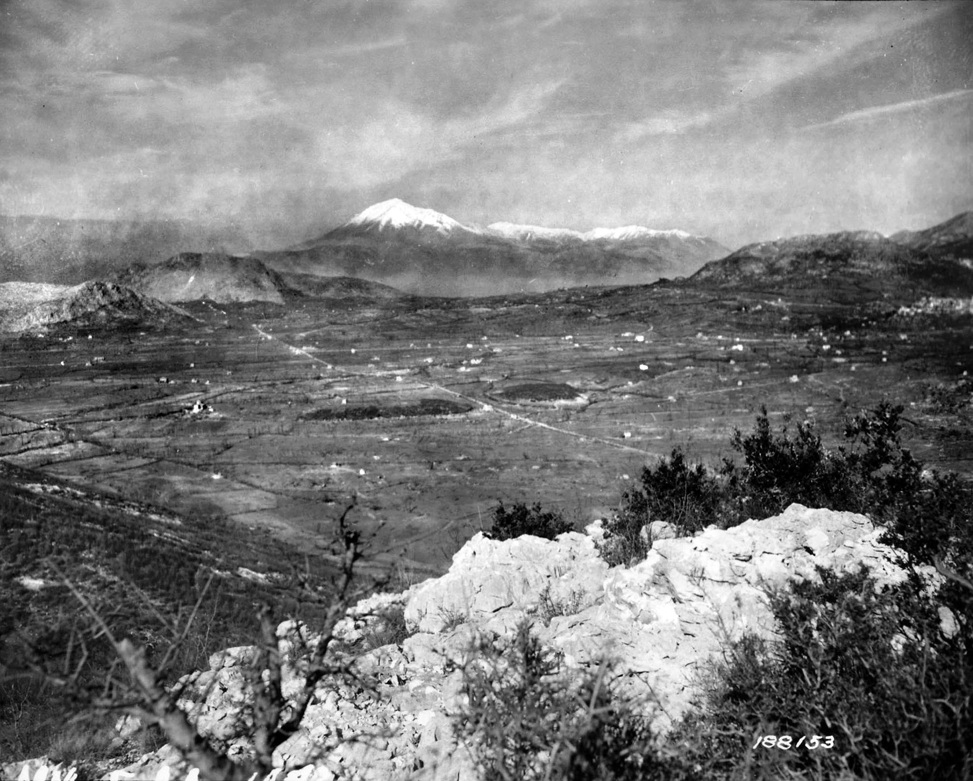 Mount Porchia looms at left in this image, while Mount Chiaia is at right, and the snow-covered peak of Mount Cairo is seen in the distance. American combat engineers fought fiercely to take and hold high ground during the sluggish advance. 