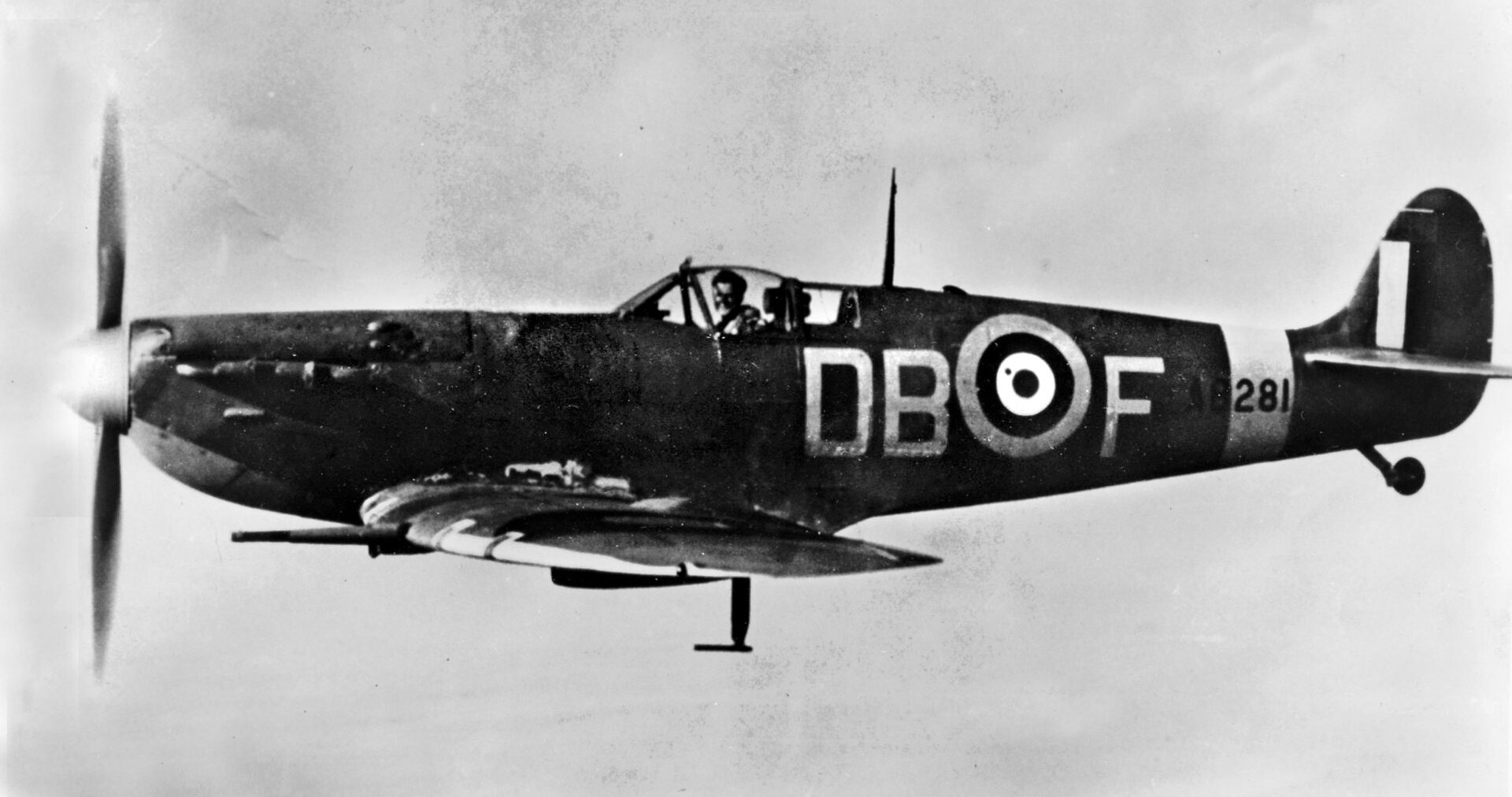 RCAF pilot Ash was photographed in his Supermarine Spitfire fighter.