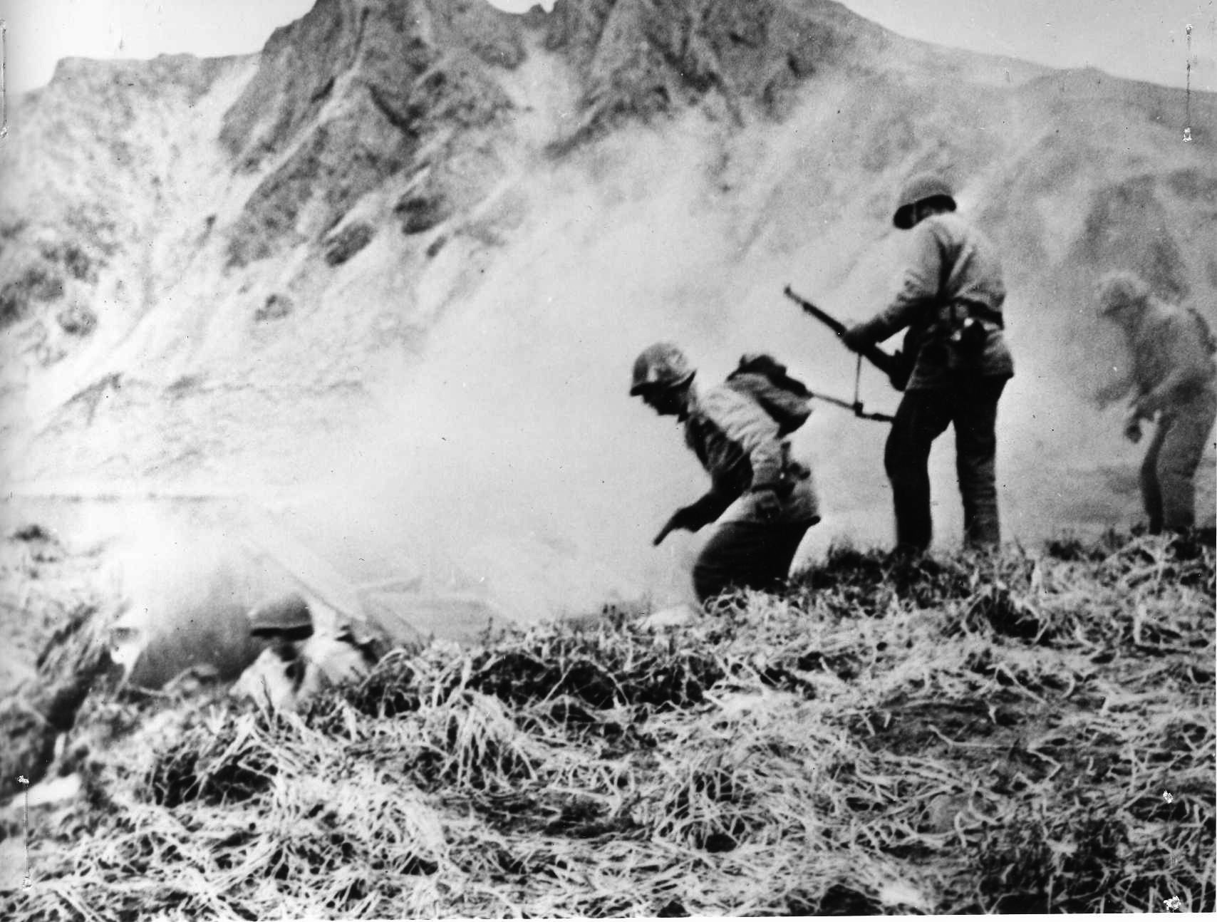 Pushing inland on Attu, Americans had to pry Japanese soldiers from dugouts in the bleak, snow covered-mountains.