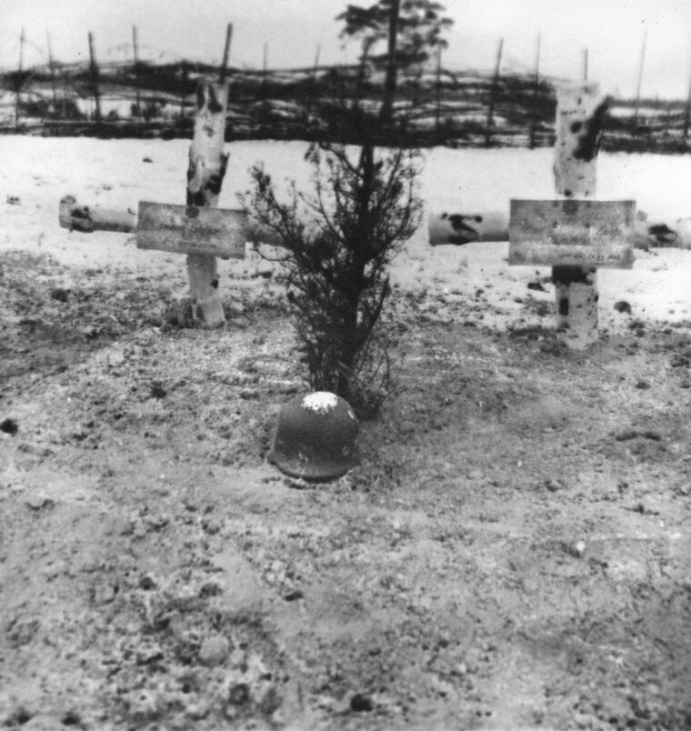 Karl Fuchs’s grave (right) on the battlefield the village of Syrapkoje near Klin, north of Moscow. The graveyard no longer exists. 
