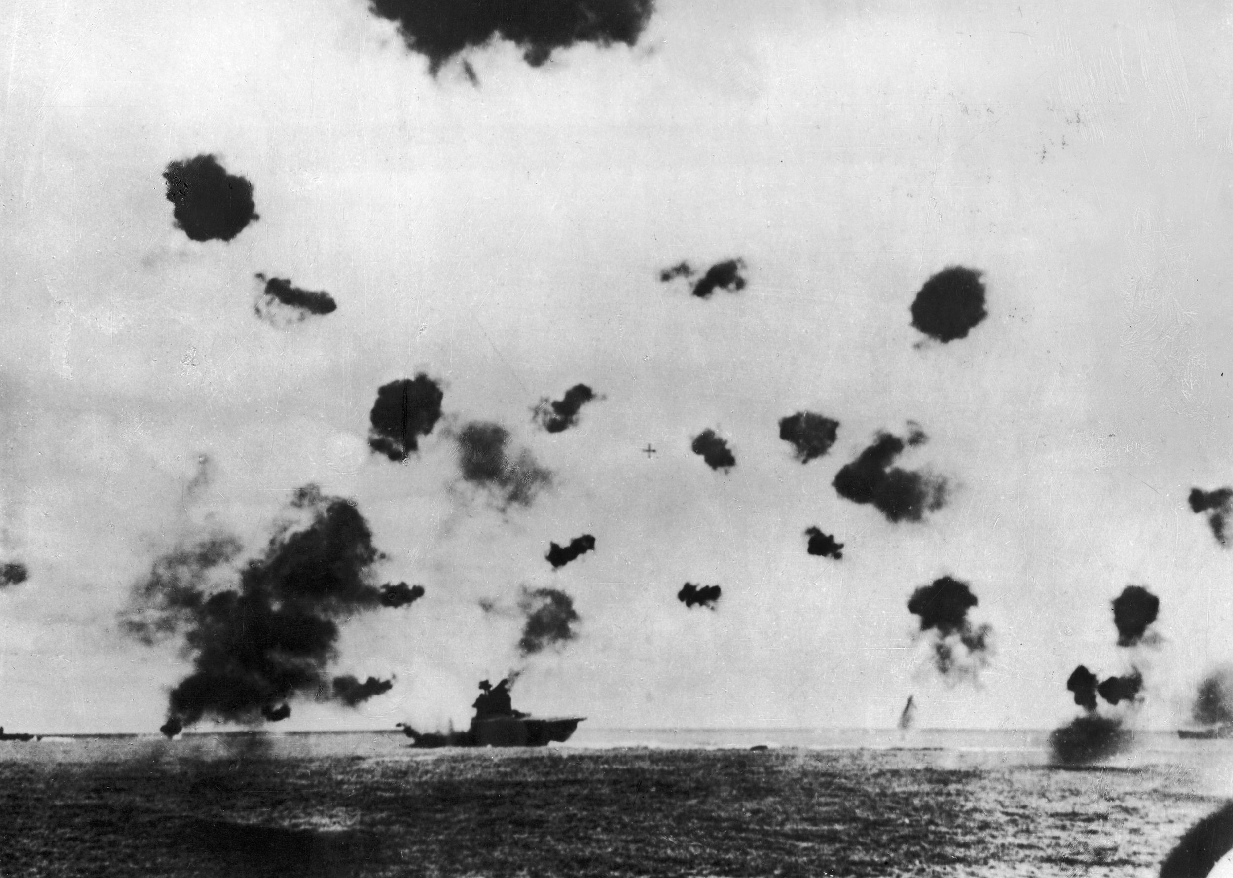 USS Yorktown, hit on the port side by a Japanese torpedo from the carrier Hiryu. This was the second torpedo hit on the ship during the battle. 