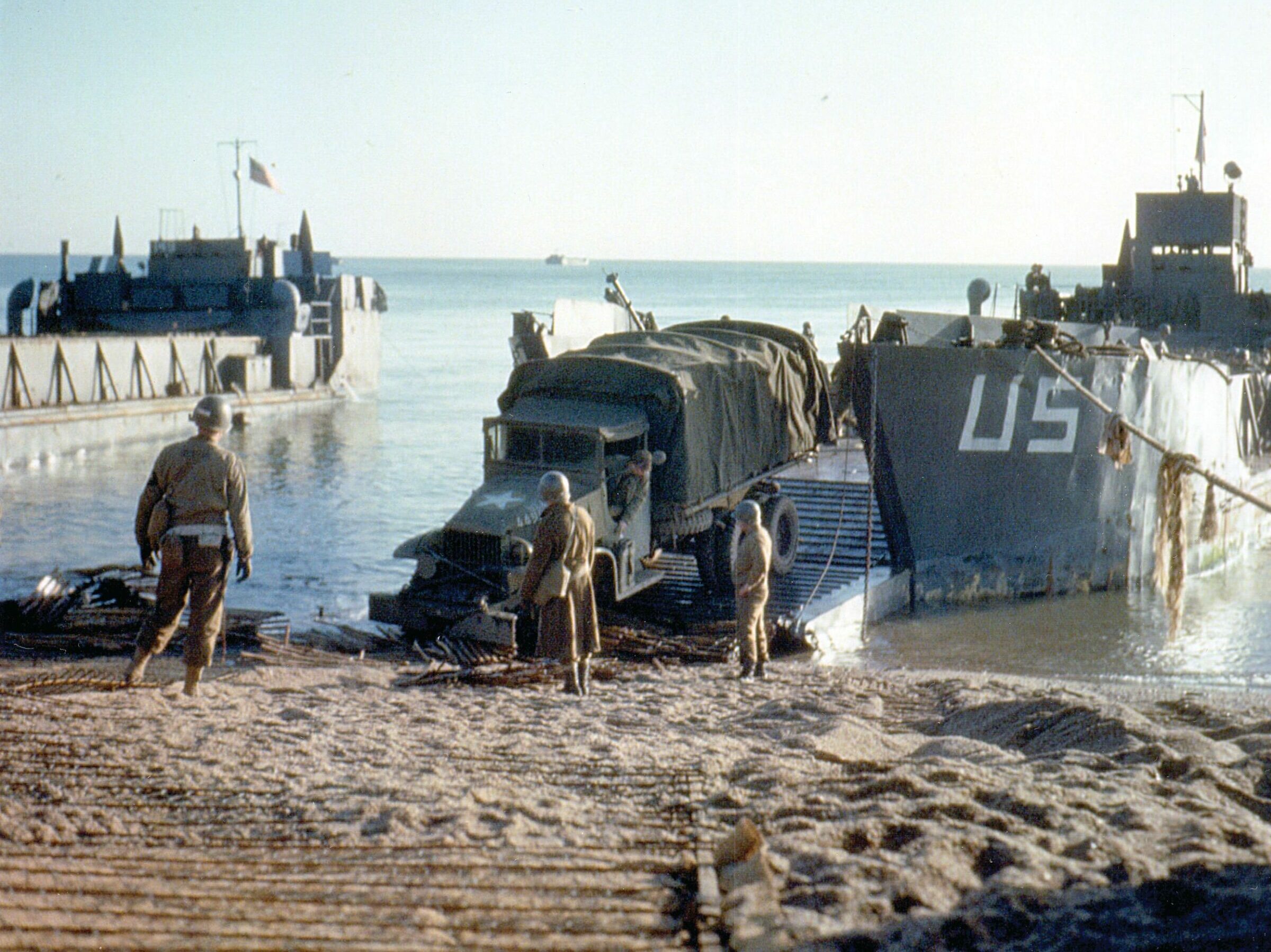 A truck rolls out of an LST at Slapton Sands.