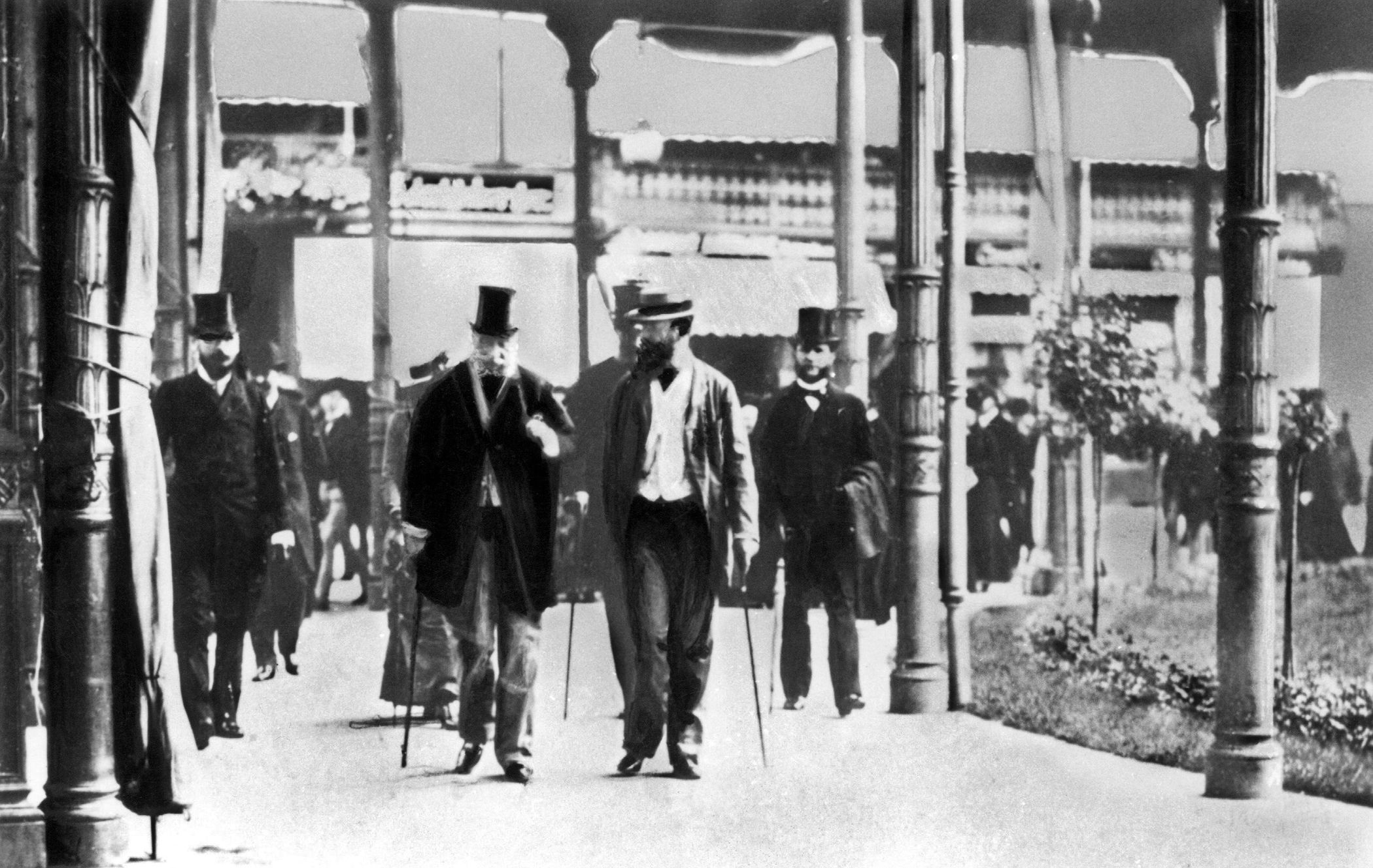 Straw-hatted French ambassador Count Vincent Benedetti, center right, famously encounters Prussian King Wilhelm I, center, left, at Ems, Germany.