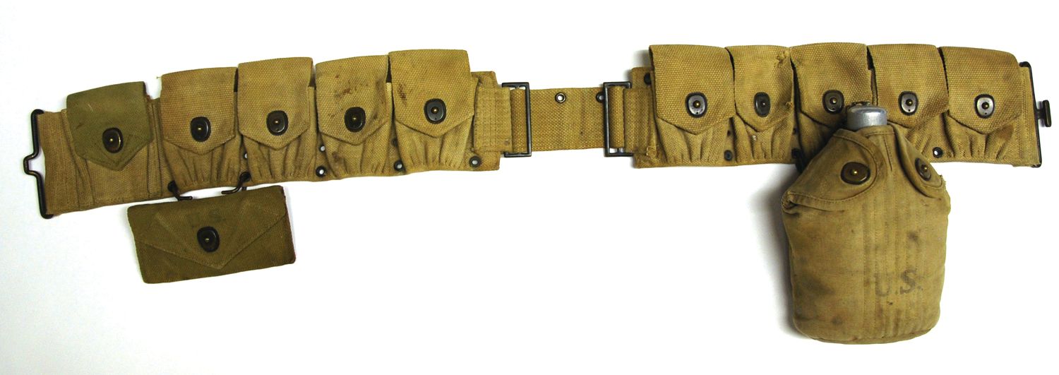 A WWI M1910 pattern infantry belt held .30-caliber Springfield rifle rounds and canteen.