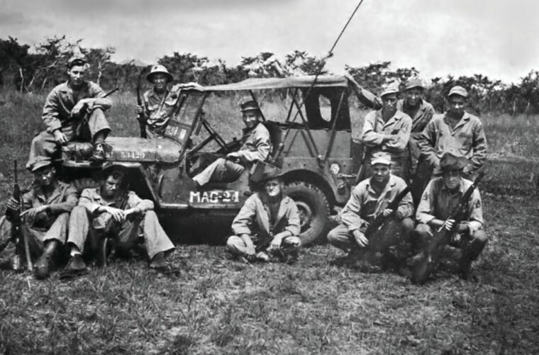 With weapons close at hand, USMC Forward Air Controllers of MAG-24 pose for a photo on Luzon, date unknown.