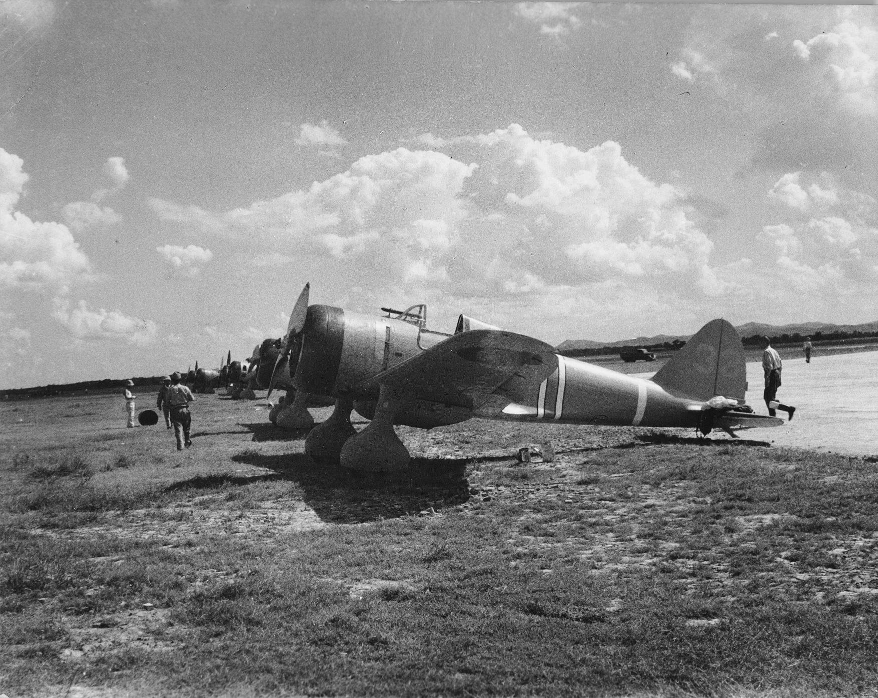 These antiquated Japanese Nakajima Ki-27 fighter planes were photographed at an airfield in Kwangtung, China, in 1938. By the 1940s, a few of these aircraft were still in service. Note the fixed landing gear.