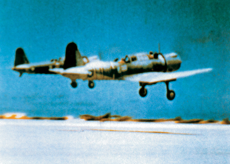 U.S. Vindicator torpedo planes take off from Midway in this motion picture still made before the battle.