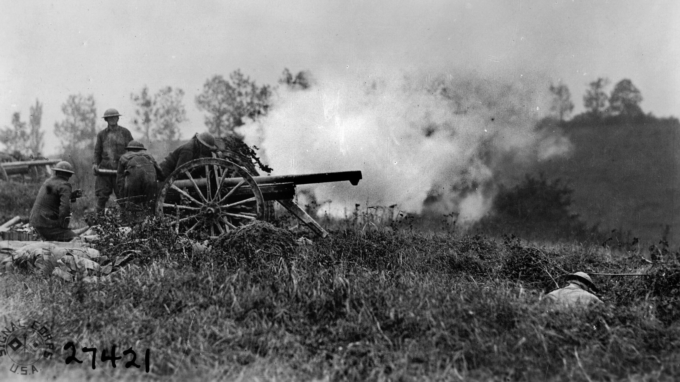 The 6th Field Artillery, attached to the 1st Division, blasts German positions in the Meuse-Argonne during World War I. The division suffered the most casualties of any American unit in the war.