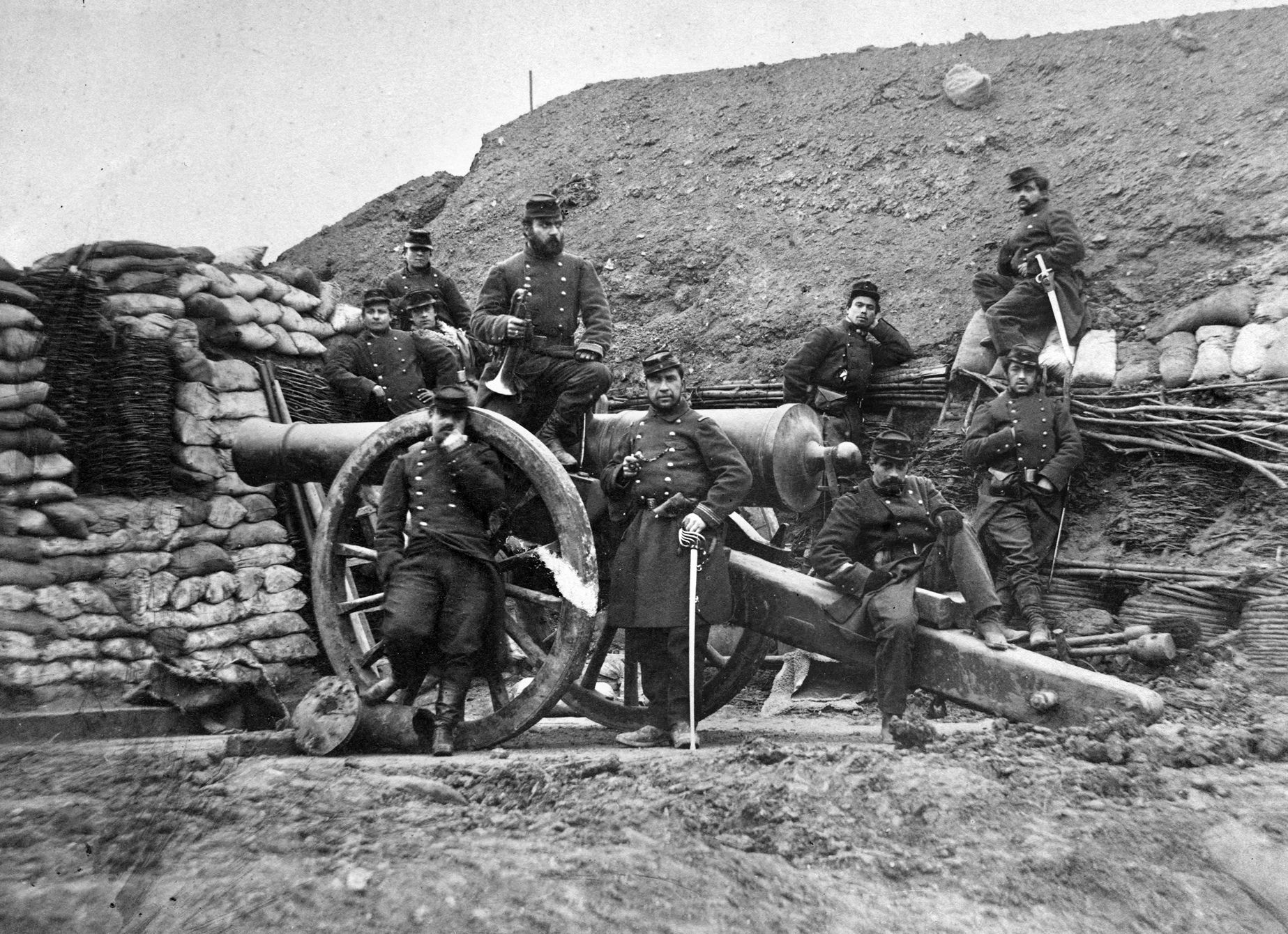 A French artillery crew poses with its gun at Sedan. The frontier fortress was sorely outdated by the time of the battle and offered no real protection from Prussian long-range guns. 