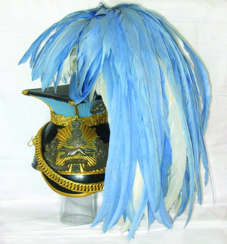 A blue-feathered British officer’s lancer cap from the East Riding of Yorkshire Yeomanry. 