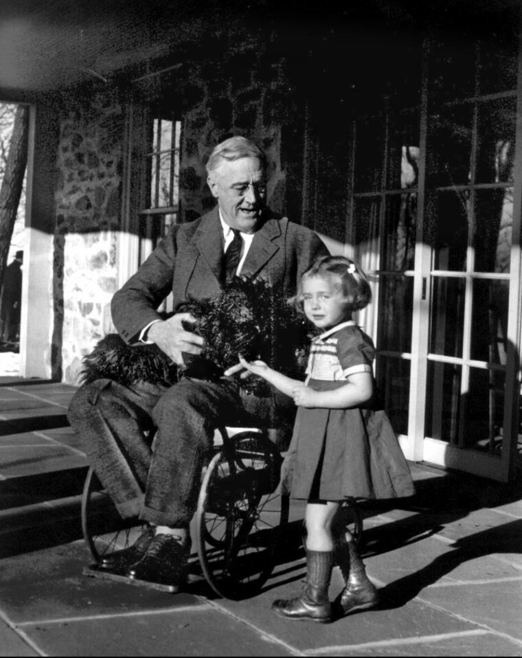 FDR at Top Cottage in February 1941 with his famous pet Scottish terrier, Fala, and Ruthie Bie, the granddaughter of his caretaker.