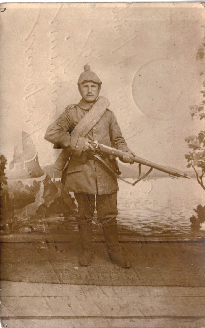A German Absender (reservist artilleryman) is pictured in this studio photo that was printed as postcard and mailed by the soldier just before he was sent to the front.