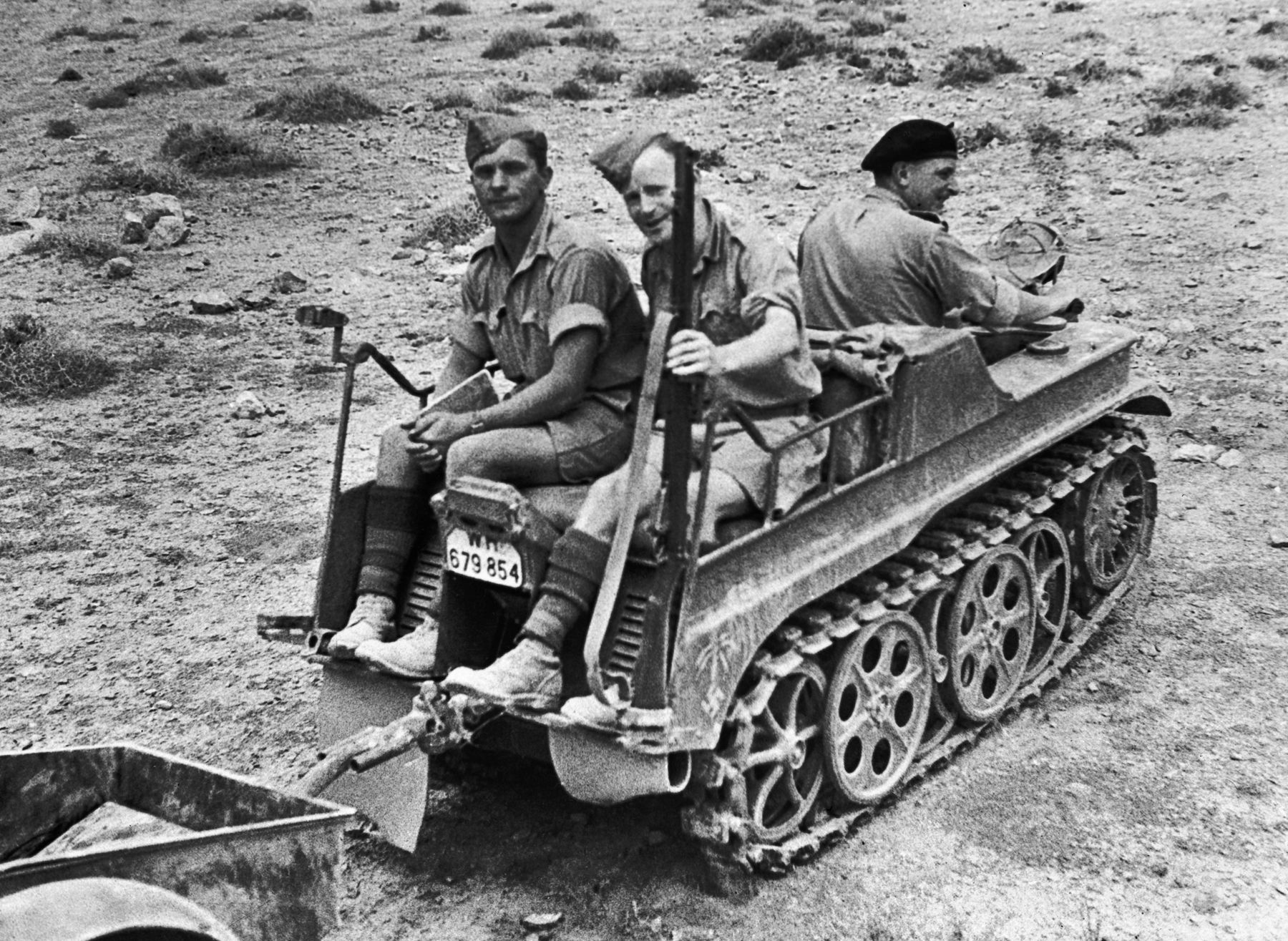 British “desert rats” hop a ride aboard a captured Kettenkrad during the North Africa campaign in June 1942. The versatile German vehicle also saw service on the Eastern Front.