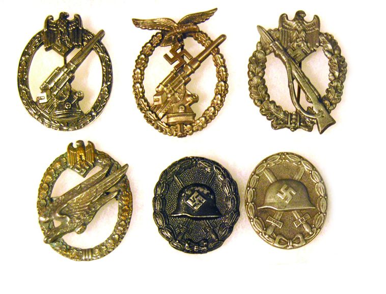 At first glance, these badges would pass inspection, but each of these supposedly original German World War II badges is a high-quality fake.