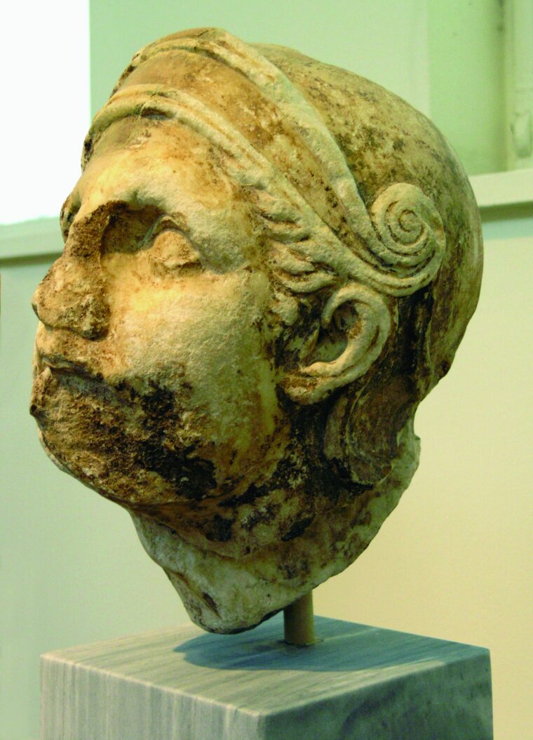 Warrior’s head unearthed at the Athena Alea temple in Tegea, from a Trojan War scene by the sculptor Scopas.
