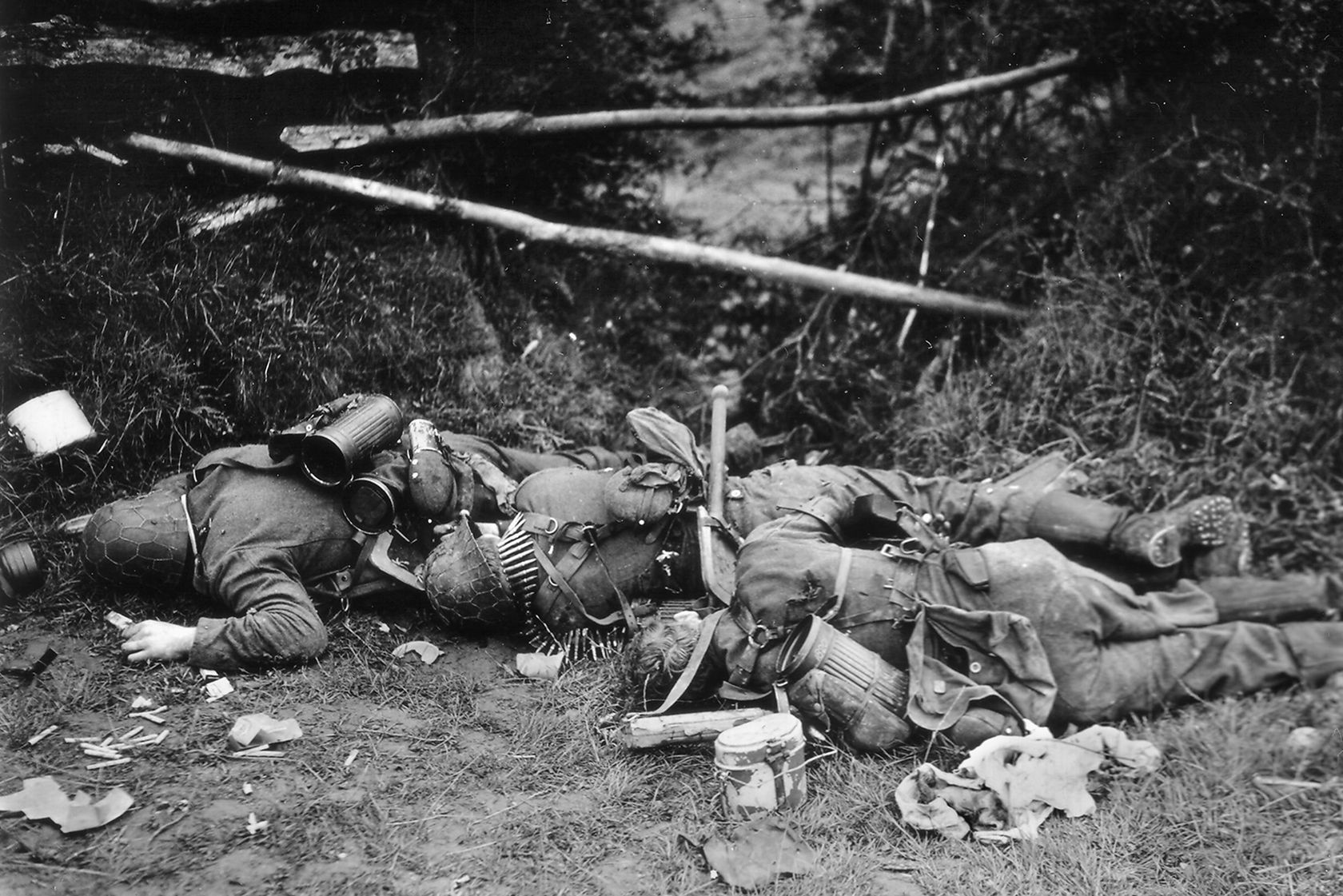 The bodies of three German soldiers killed in the fighting in Normandy.