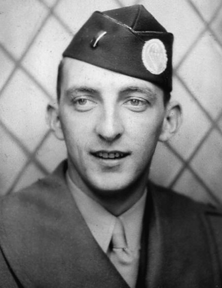 Lieutenant Vincent E. Wolf, 82nd Airborne Division, photographed in an English studio prior to D-Day.  