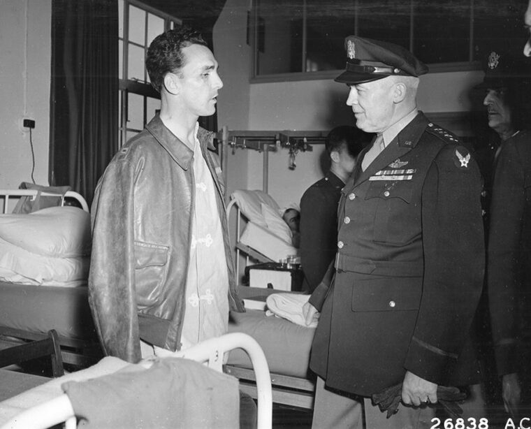 General Henry “Hap” Arnold, commanding general of the U.S. Army Air Forces, meets with the injured Captain Roland Scott of the 322nd Bomb Group after the first IJmuiden raid.
