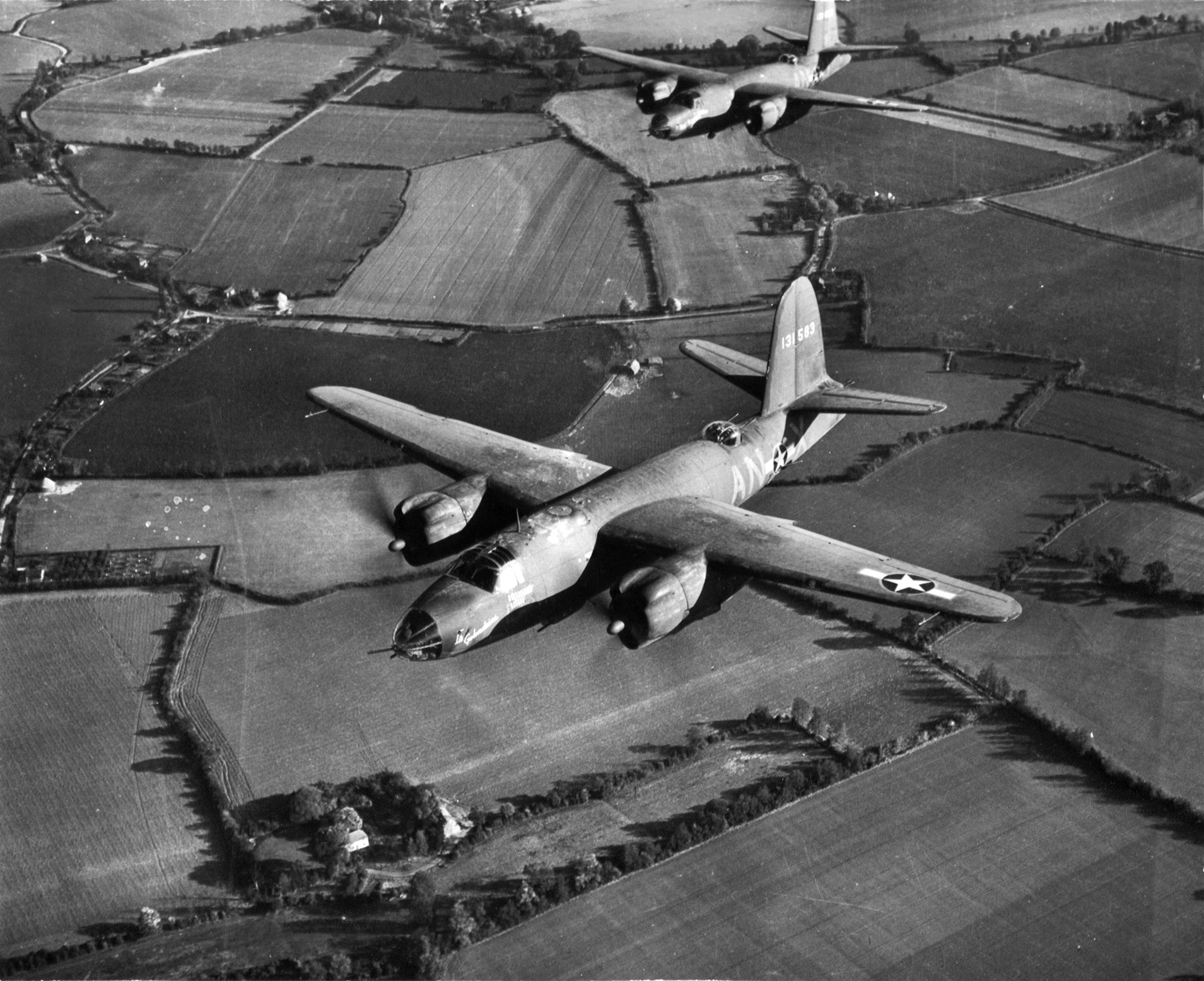 B-26 Mauraders from the 386th Bombardment Group flying over English countryside enroute to a mission over Europe.