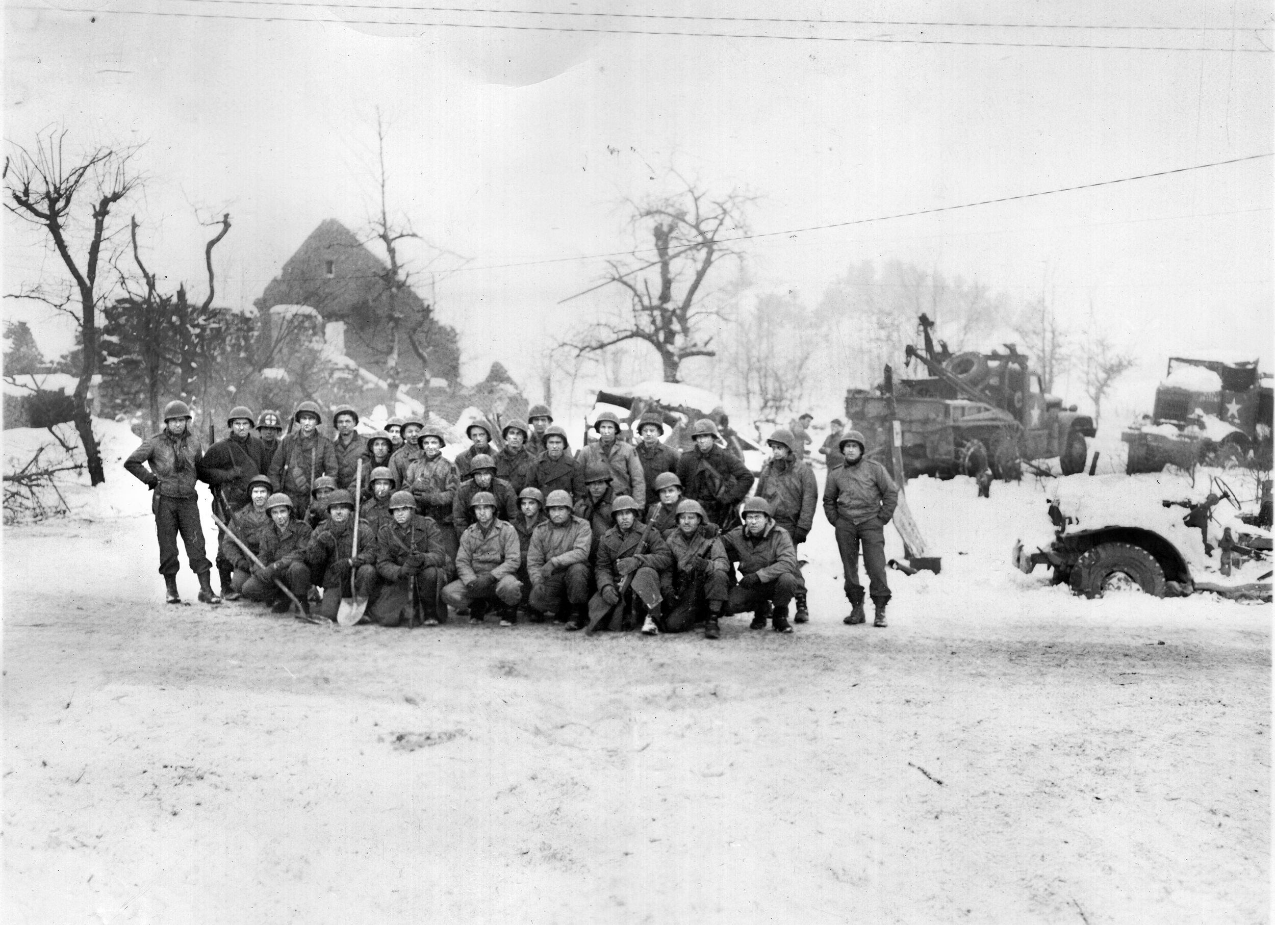 Men of Lt. Col. David E. Pergrin’s, 291st Combat Engineer Battalion were stationed in Malmedy at the time of the attack and heard German machine gun fire at the Baugnez crossroads. Company C, pictured here, was among the first to discover the bodies. Pergrin’s report alerted U.S. First Army Headquarters and word of the massacre spread through the American Army. 