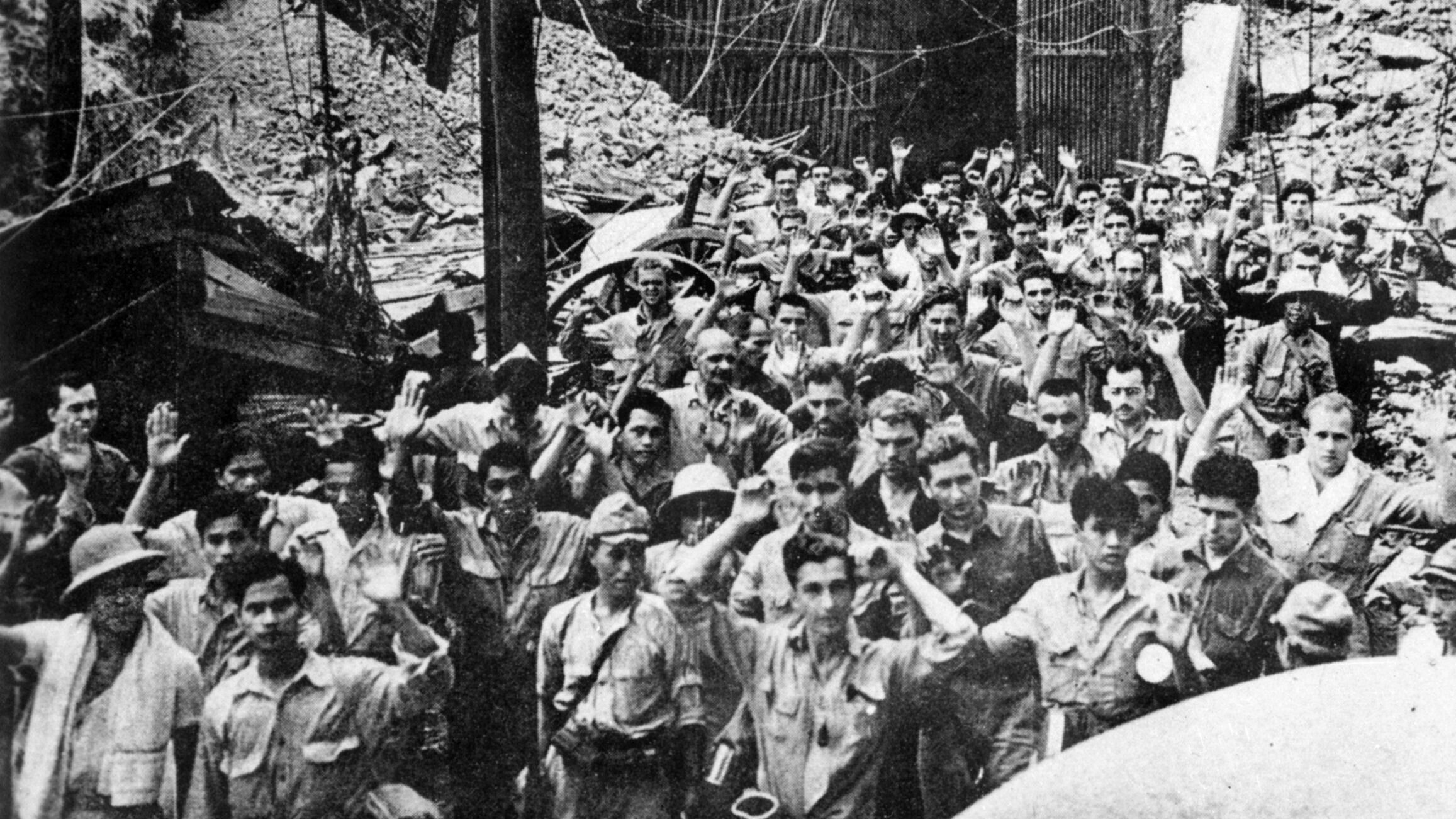 Captured Japanese photo of American and Filipino soldiers and sailors taken prisoner after the fall of Corregidor, May 6, 1942.