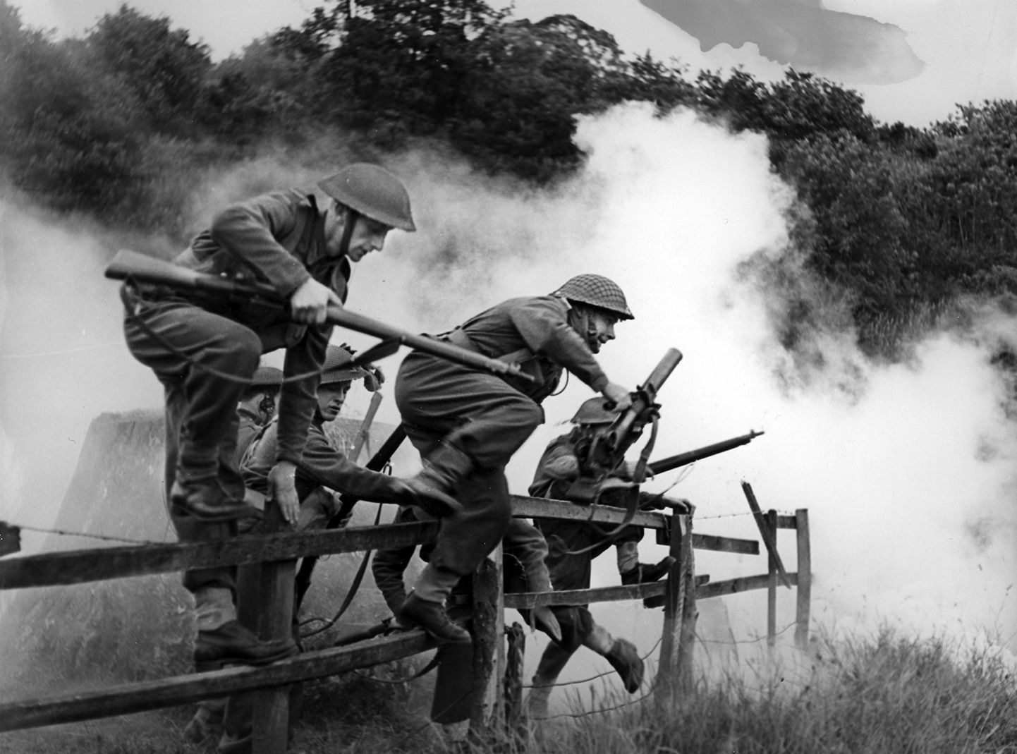 Equipped with British uniforms and weapons, Polish soldiers run an obstacle course at one of their training camps in Britain.