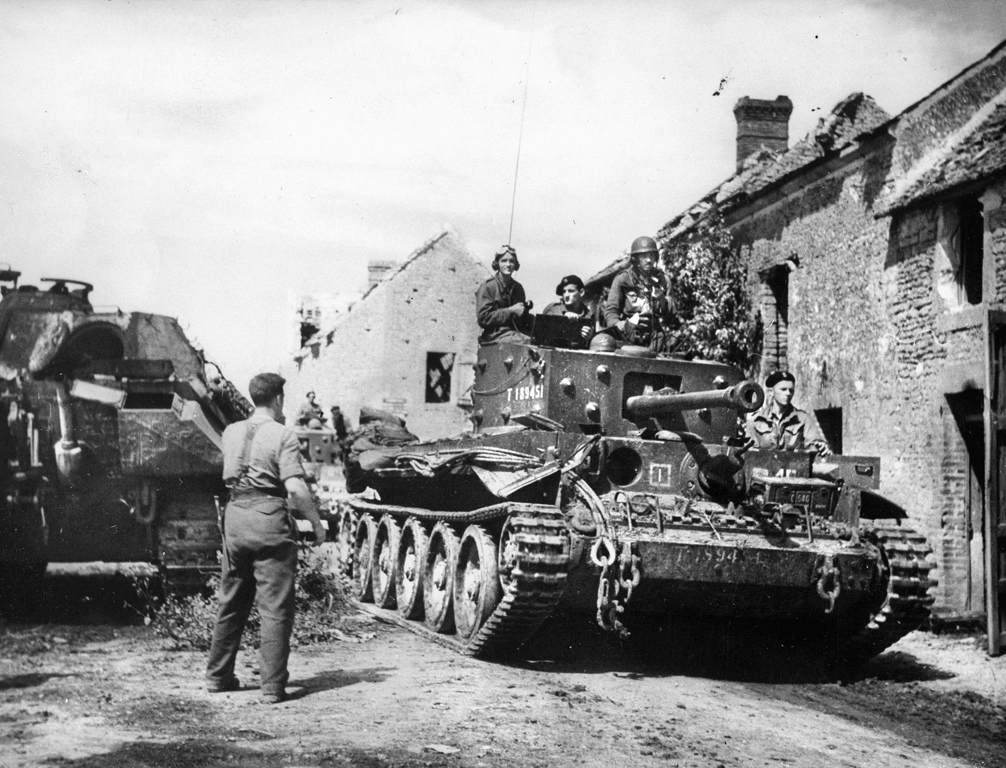 Champing at the bit to pay back the Germans for what they had done to their country, Polish troops made a good account of themselves in battle. Here, a Polish Cromwell moves through St. Lambert, between Trun and Chambois, during the Falaise campaign. 