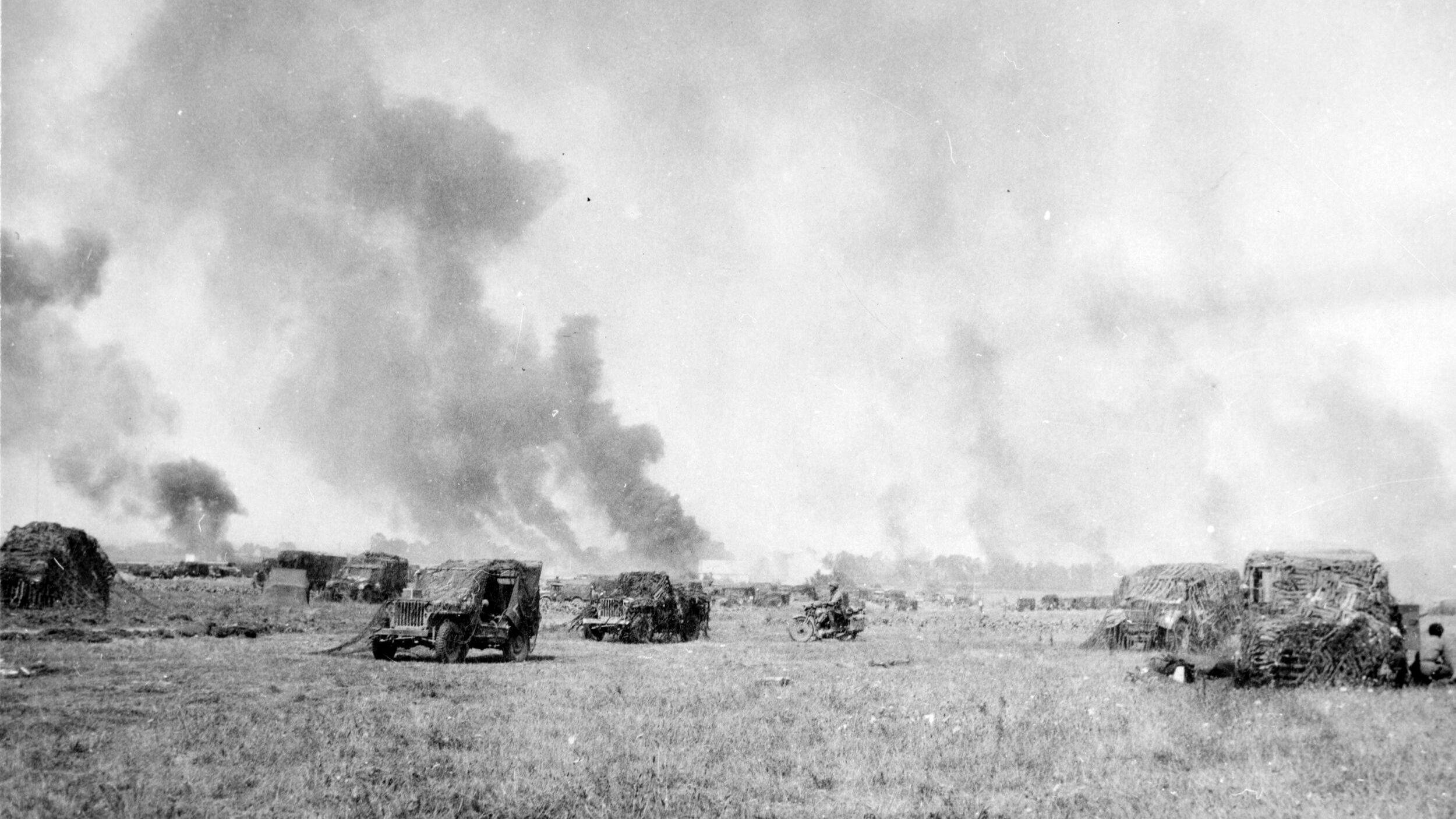 Vehicles of the 24th Polish Lancer Regiment move into position during the battle to cut off the German retreat at Falaise. 