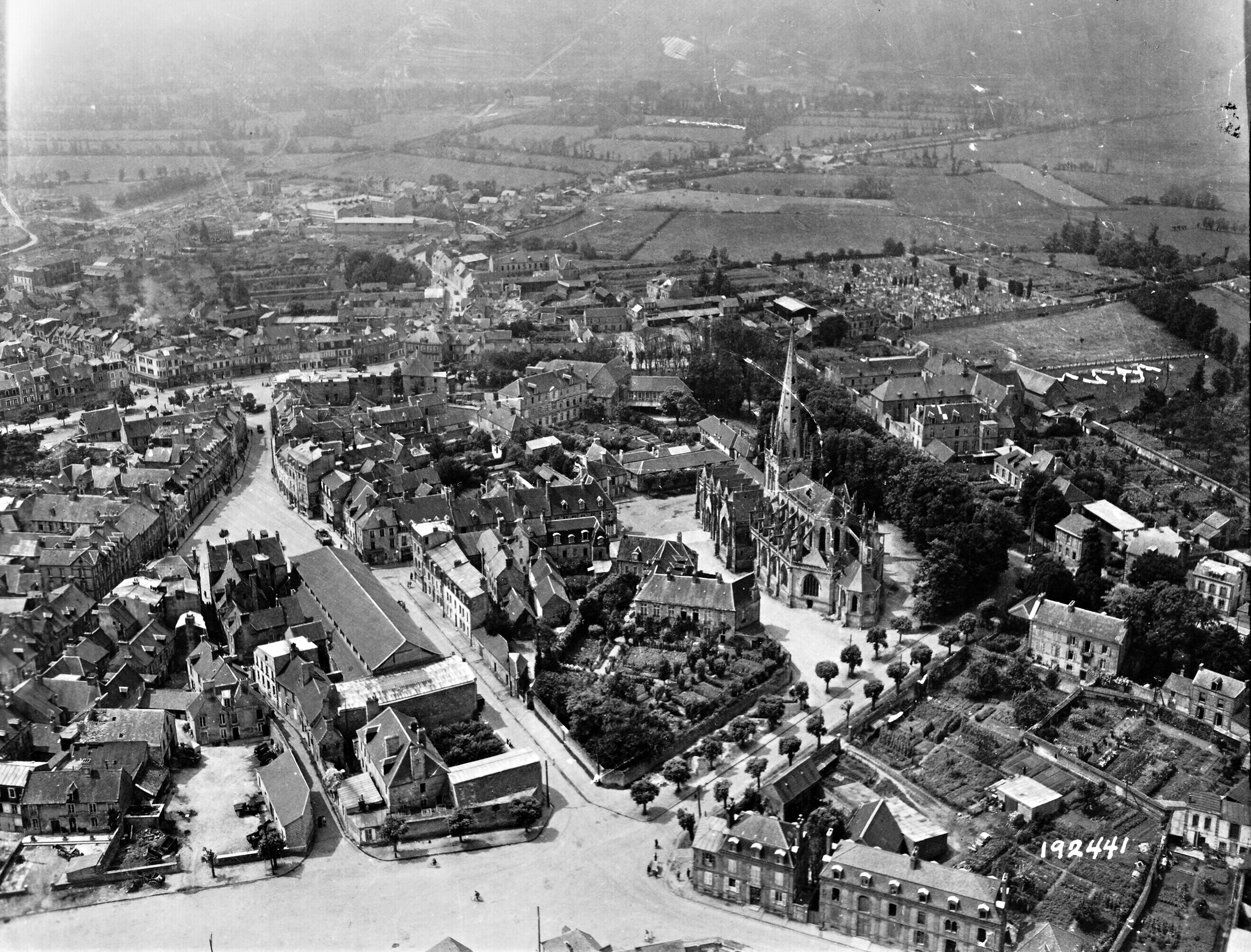 Aerial reconnaissance photo of Carentan taken before the heavy fighting reduced much of the town to rubble.